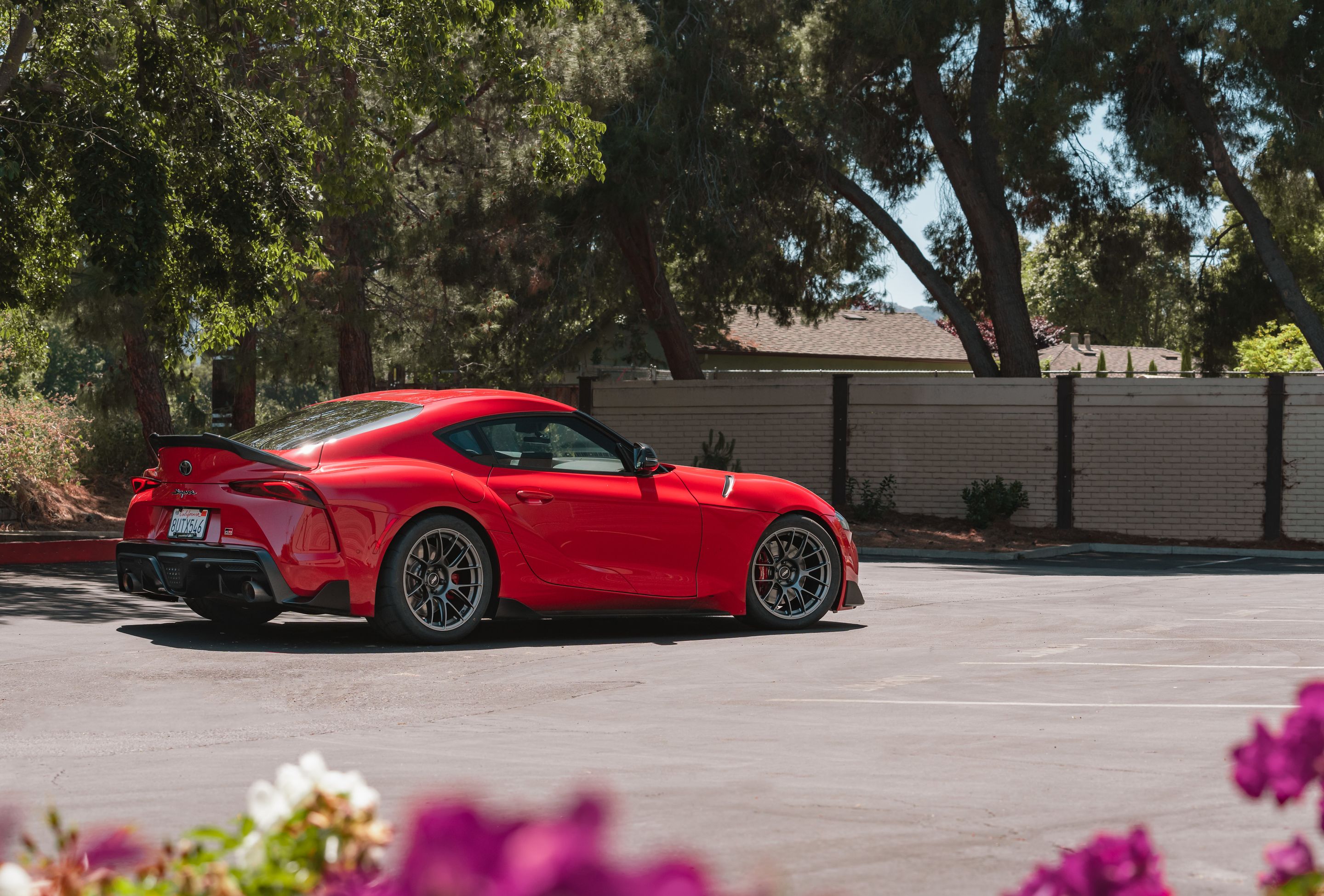 Red Toyota GR Supra with 18" EC-7RS Apex wheels in Anthracite
