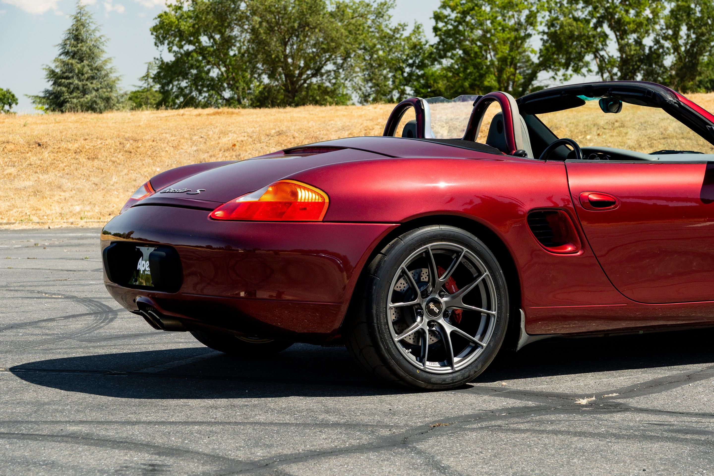 Red Porsche 986 Boxster with 18" VS-5RS Apex wheels in Anthracite