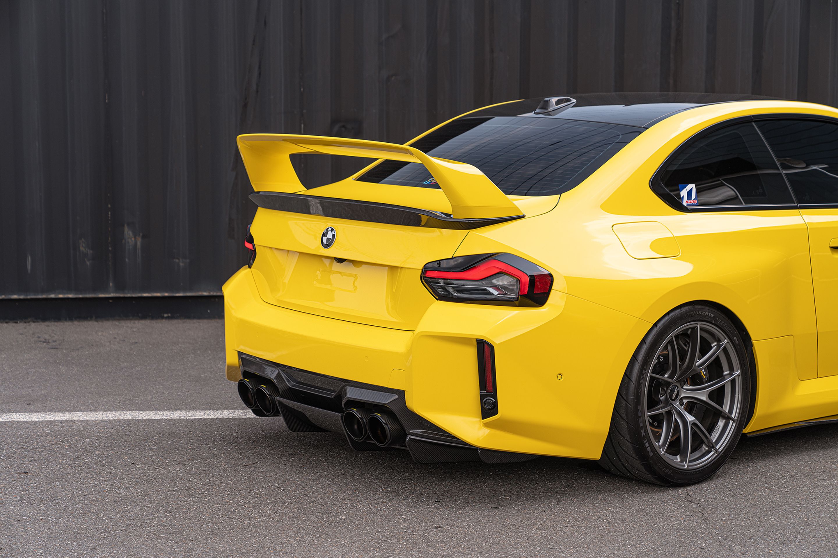 Yellow BMW G87 M2 with 19" VS-5RS Apex wheels in Anthracite
