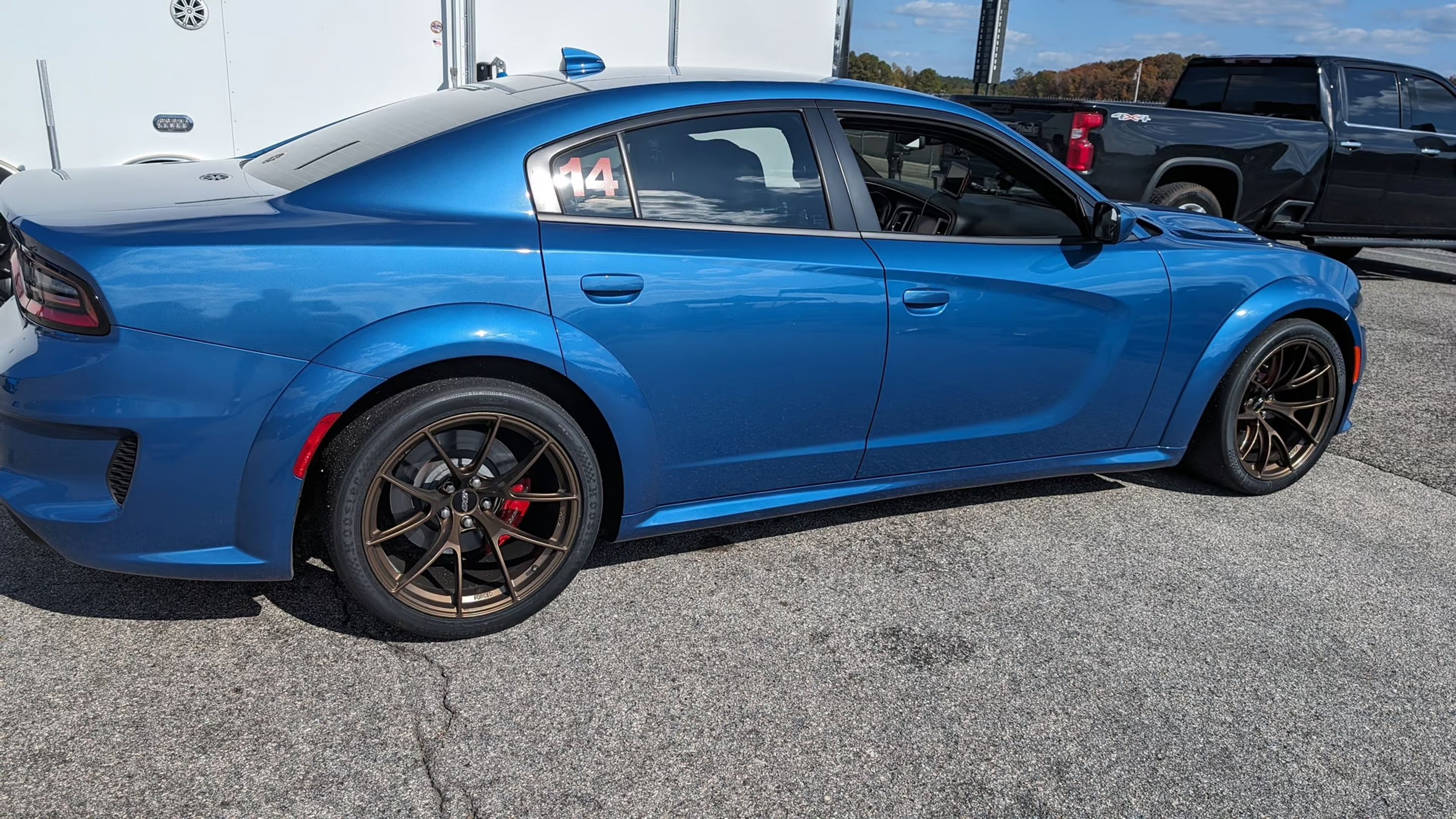 Blue Dodge Charger SRT Hellcat Redeye Widebody with 20" VS-5RS Apex wheels in Satin Bronze