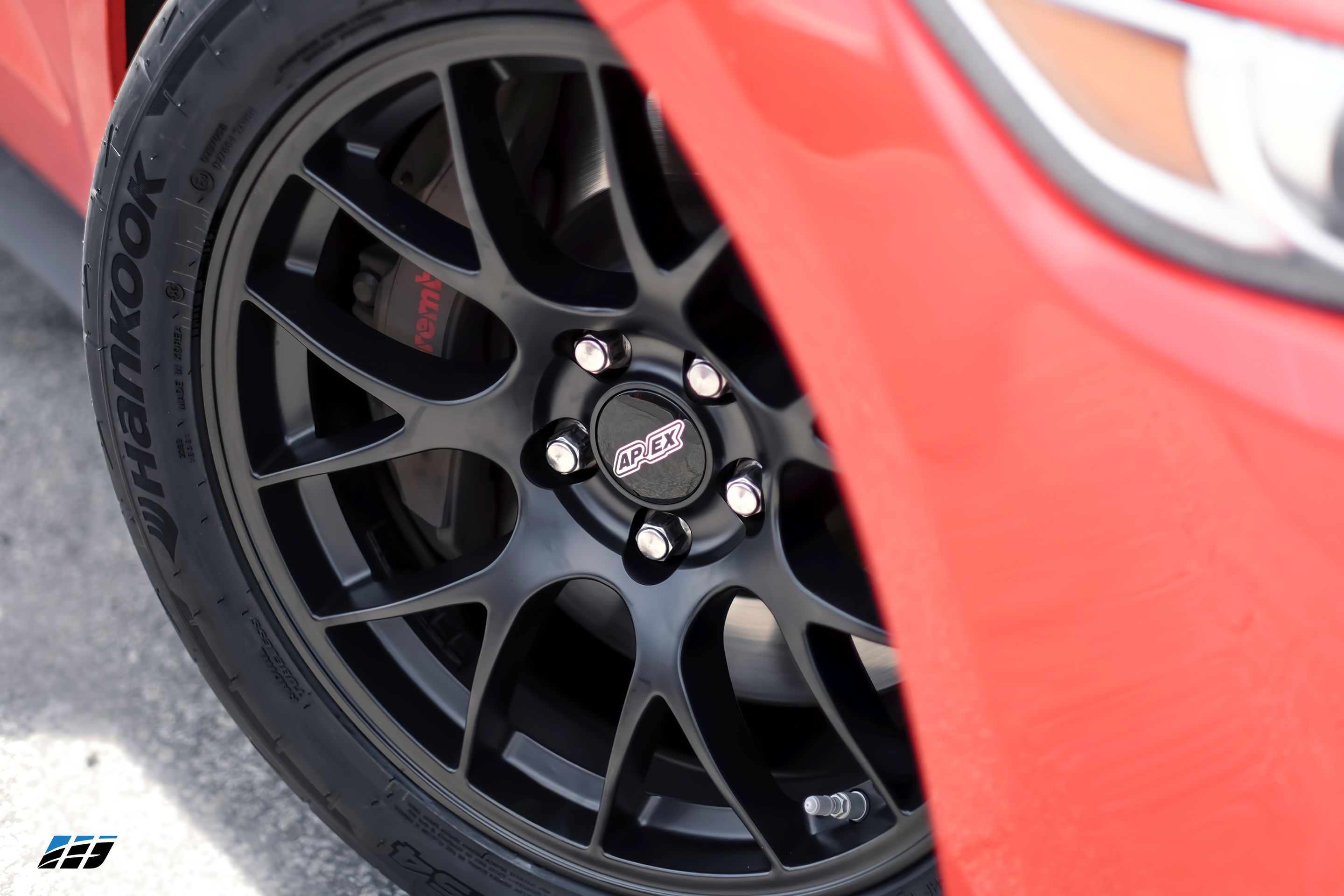 Red Ford S550 Mustang GT with 18" EC-7 Apex wheels in Satin Black