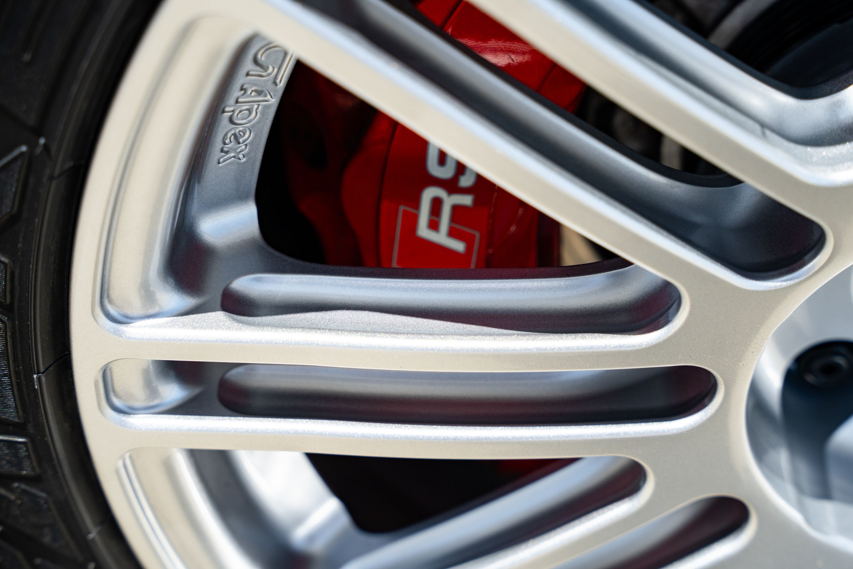 Grey Audi 8Y RS 3 with 18" TC-10RT Apex wheels in Race Silver