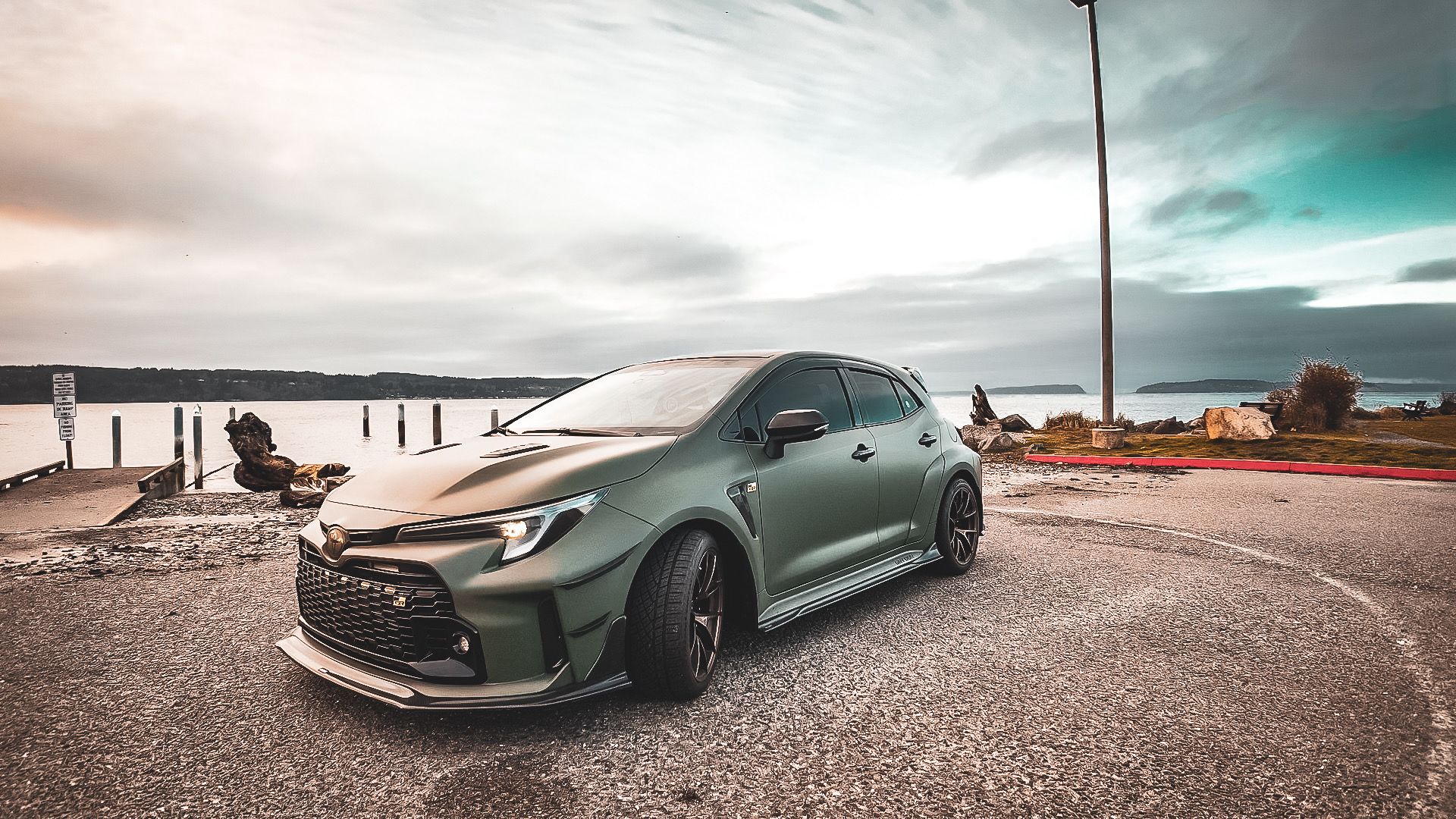 Green Toyota GR Corolla with 18" VS-5RS Apex wheels in Satin Bronze