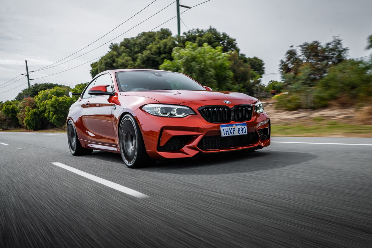 Orange BMW F87 M2 with 19" EC-7 Apex wheels in Anthracite