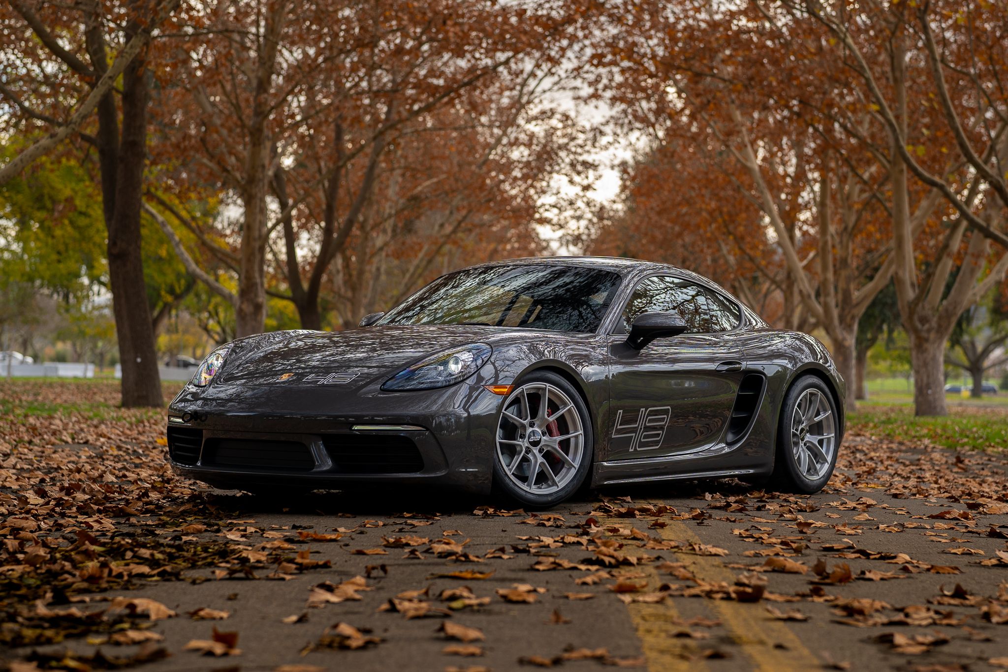 Grey Porsche 718 Cayman S with 18" VS-5RS Apex wheels in Brushed Clear