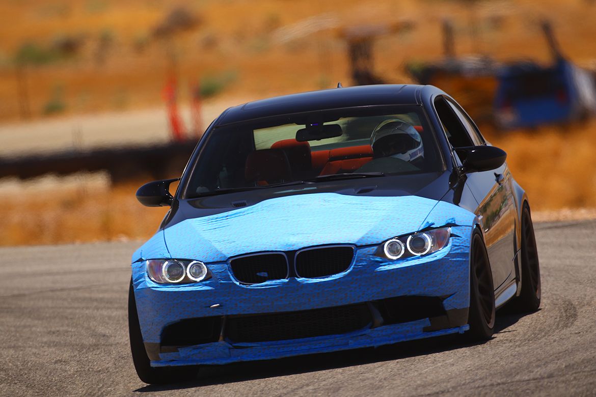 Black BMW E92 Coupe M3 with 18" ARC-8 Apex wheels in Satin Bronze