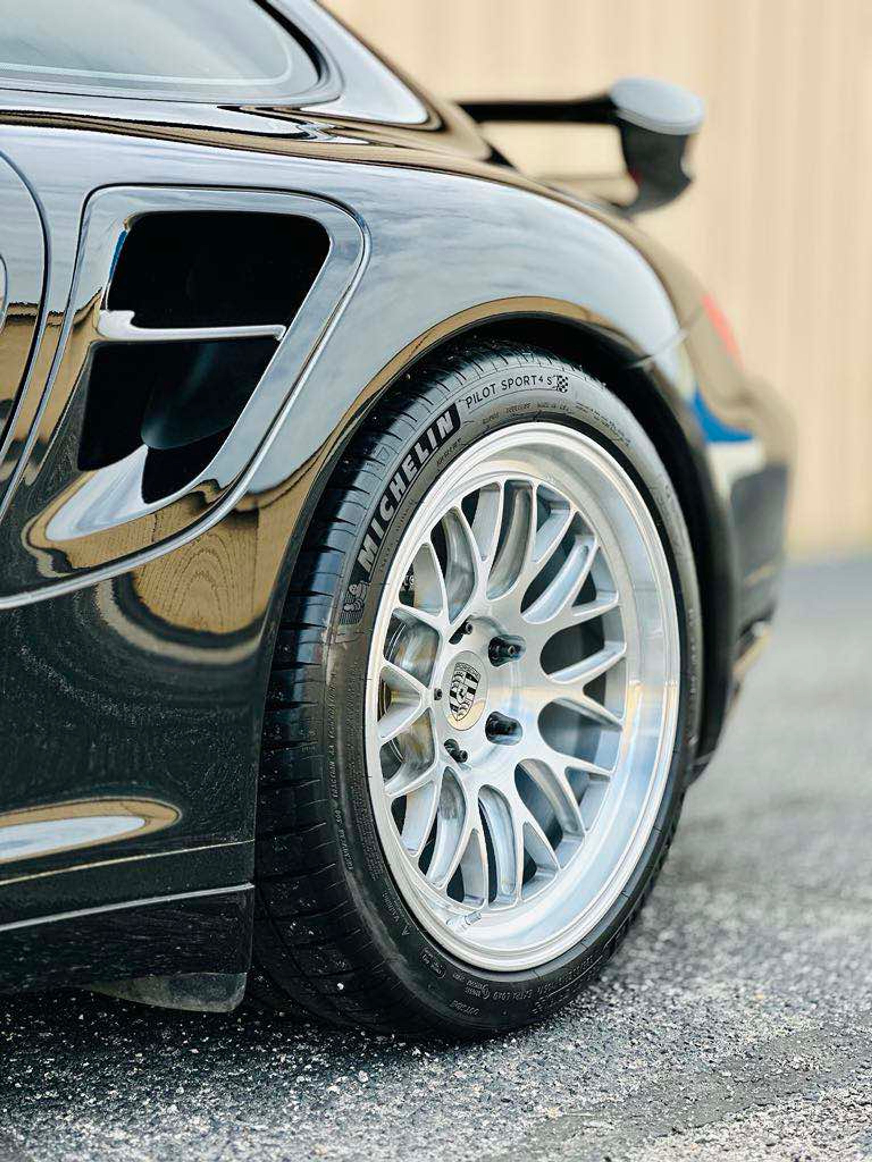 Black Porsche 911 997 Turbo with 19" ML-10RT Apex wheels in Machined Lip Brushed Clear