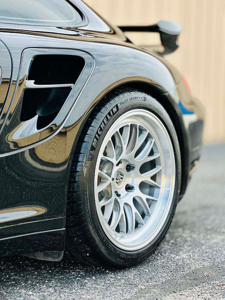 Black Porsche 911 997 Turbo with 19" ML-10RT Apex wheels in Machined Lip Brushed Clear