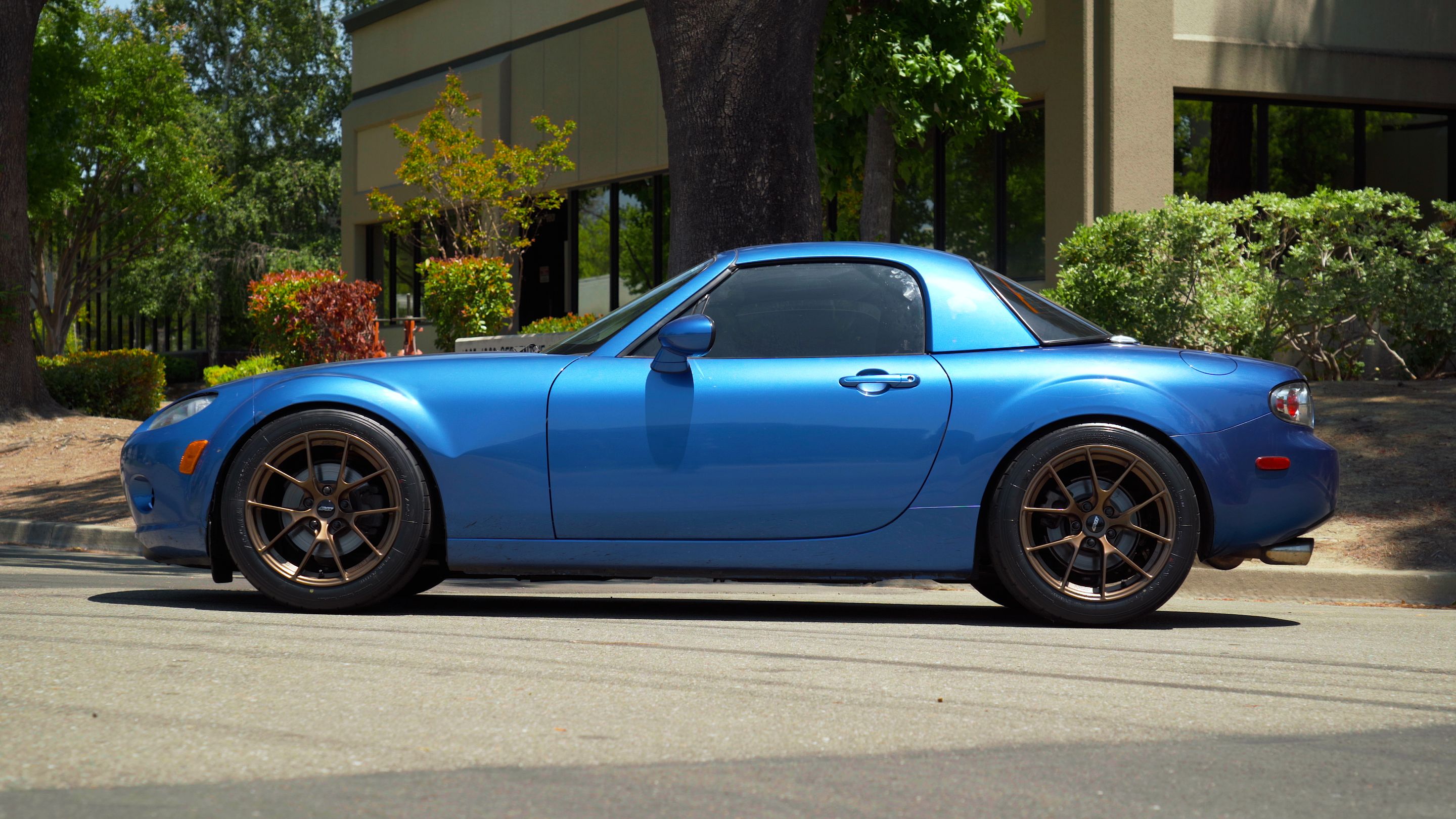 Blue Mazda NC MX-5 Miata with 17" VS-5RS Apex wheels in Satin Bronze