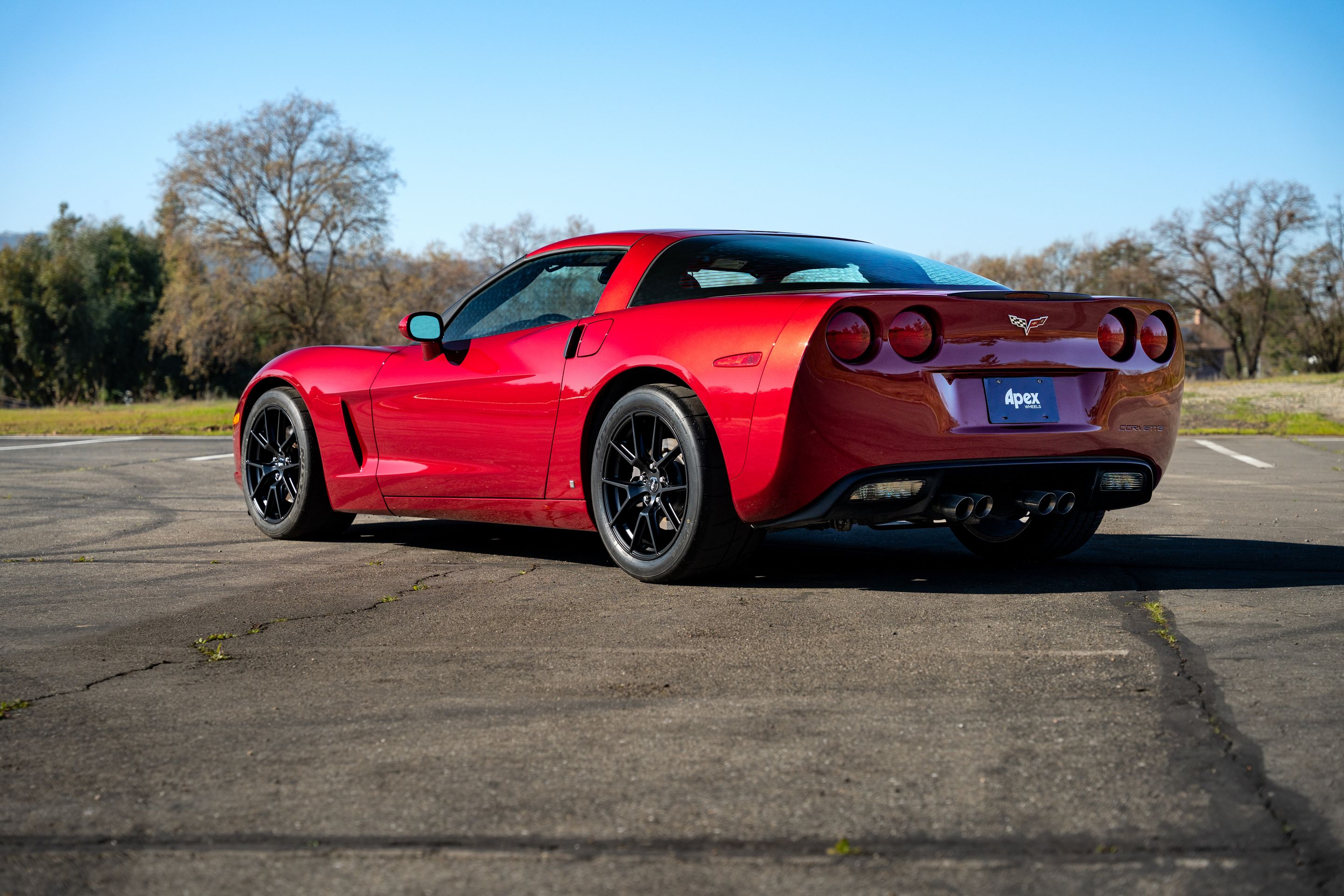 Red Chevrolet C6 Corvette Base/Z51 with 18" VS-5 Apex wheels in Satin Black