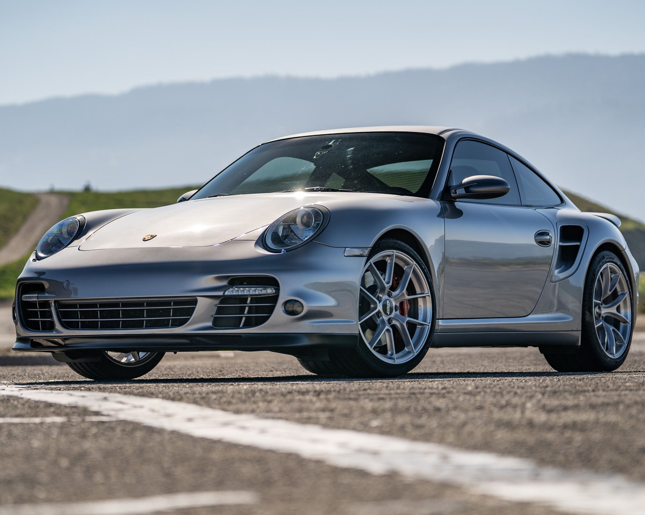 Silver Porsche 911 997 Turbo with 19" VS-5RS Apex wheels in Brushed Clear