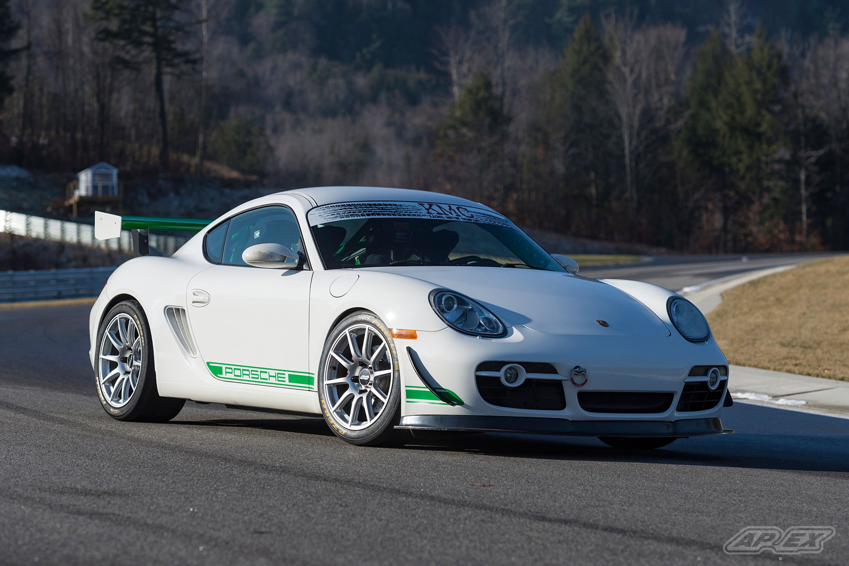 White Porsche 987 Cayman S with 18" SM-10 Apex wheels in Race Silver