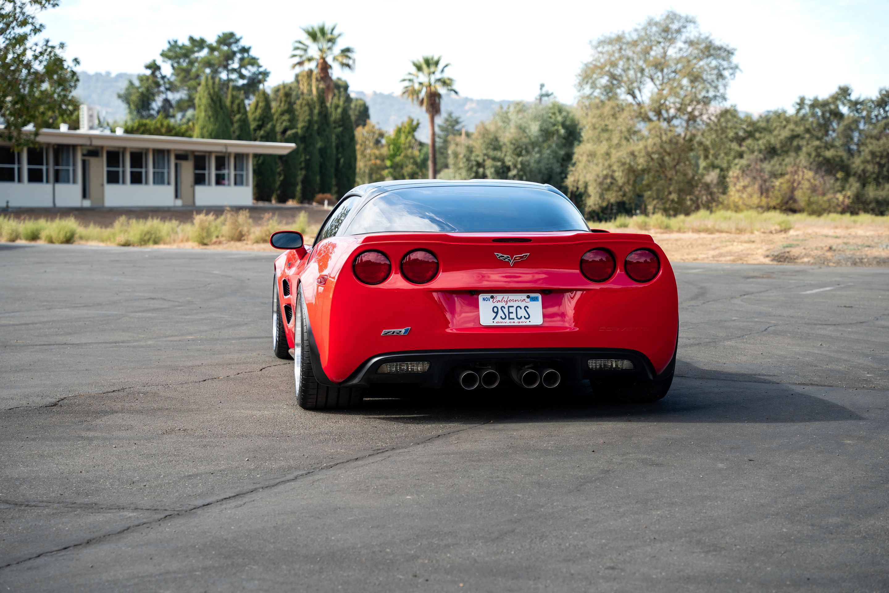 Red Chevrolet C6 Corvette ZR-1 with 18"/19" ML-10RT Apex wheels in Machined Lip Race Silver