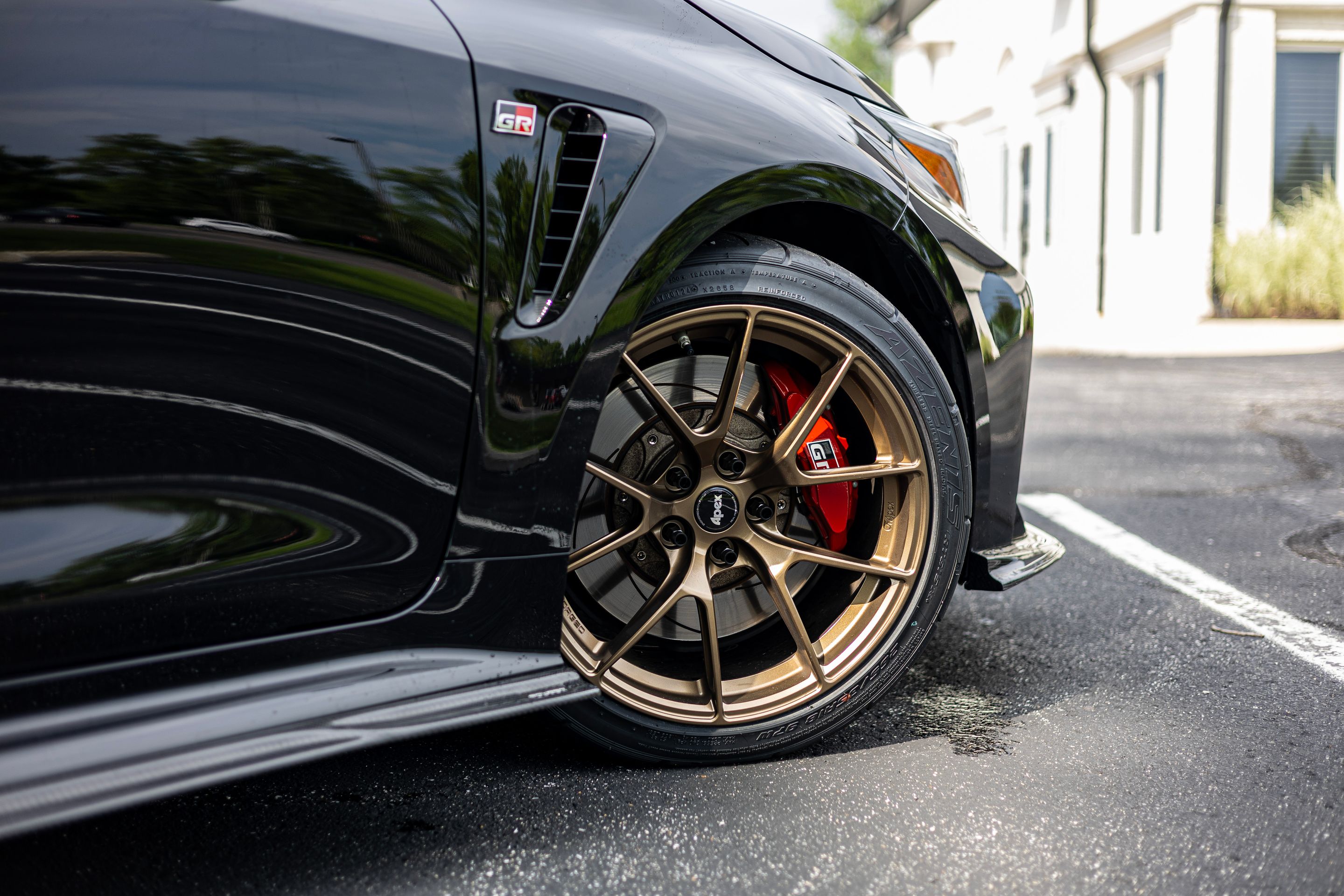 Black Toyota GR Corolla with 18" VS-5RS Apex wheels in Satin Bronze