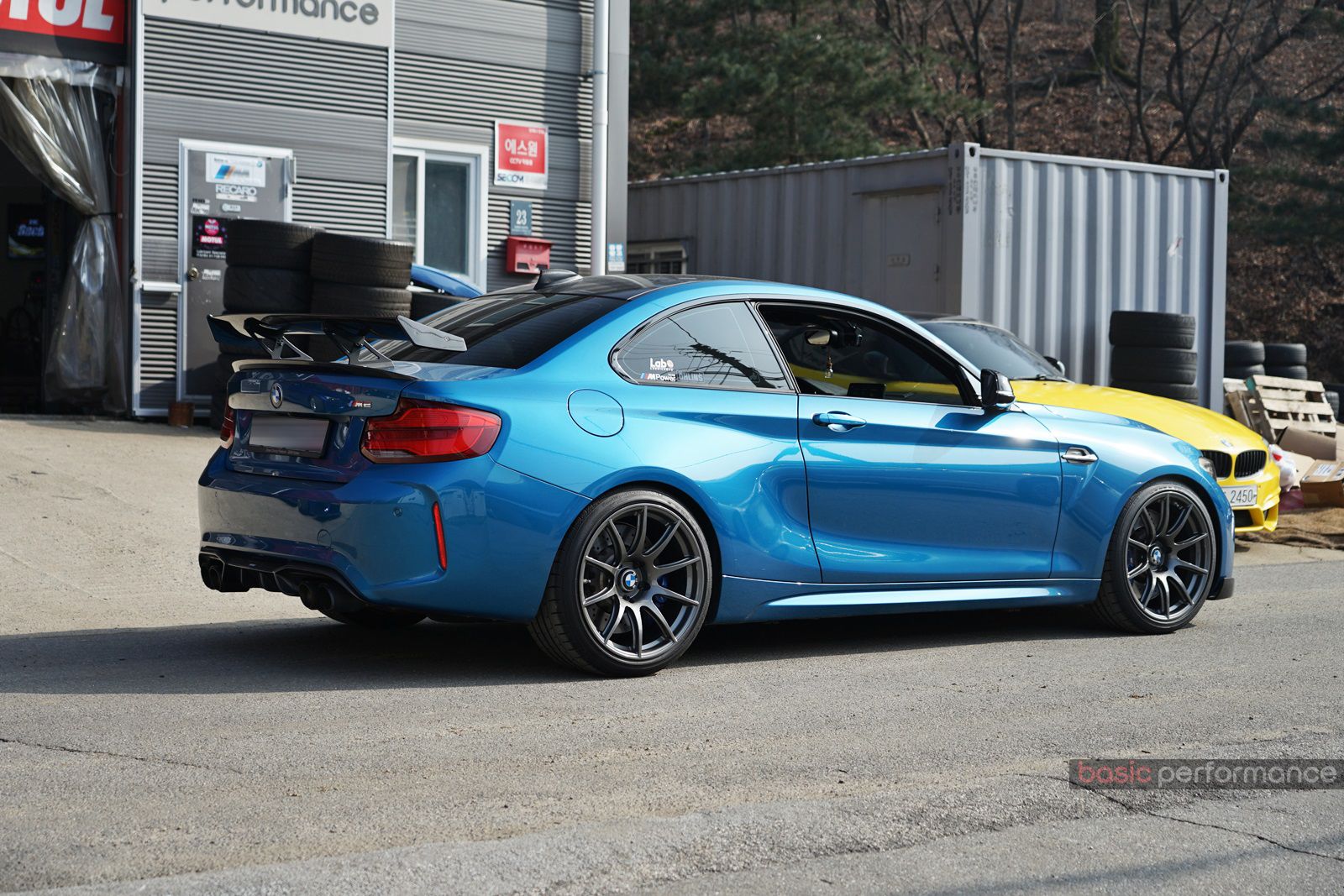 Blue BMW F87 M2 with 19" SM-10 Apex wheels in Anthracite