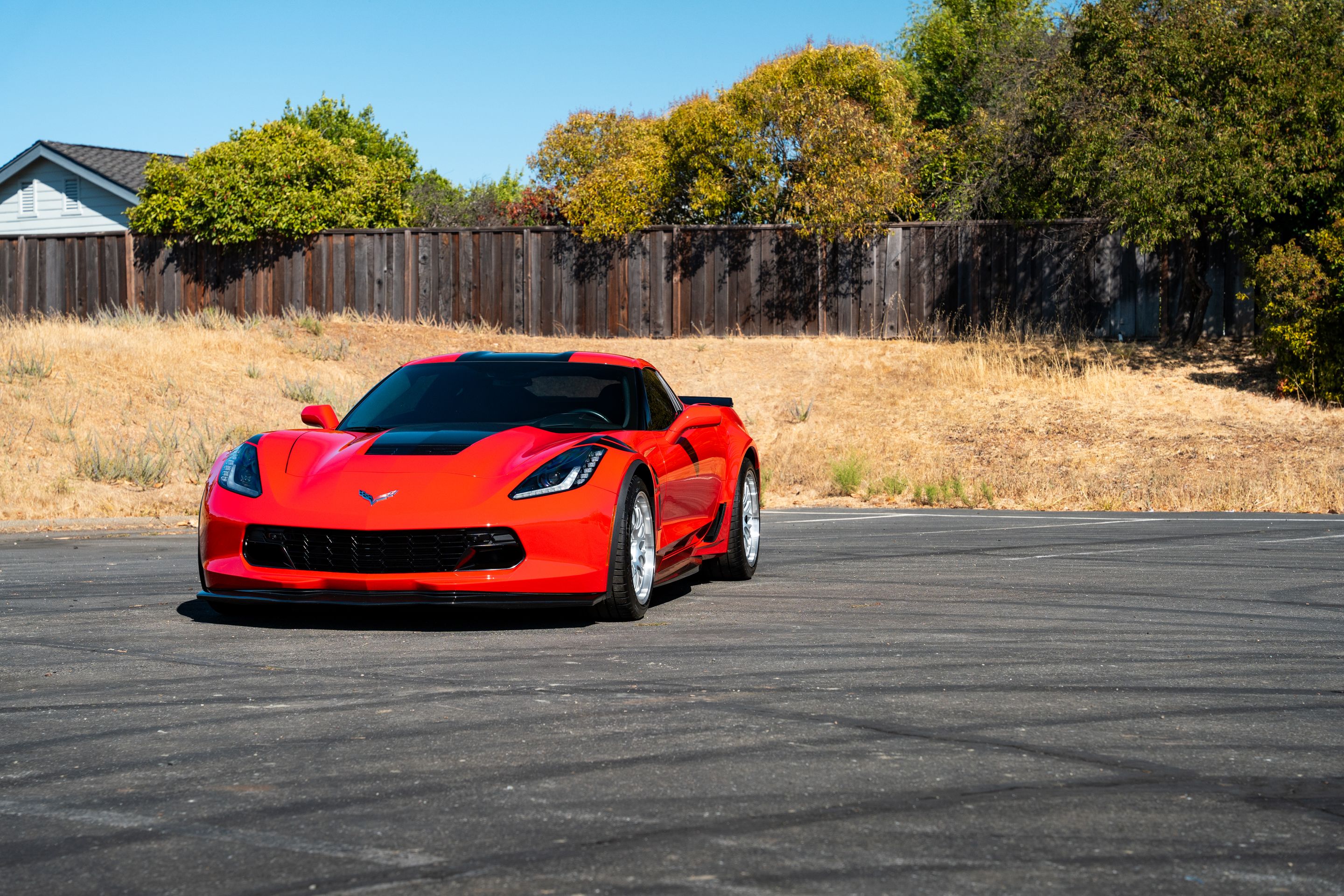 Red Chevrolet C7 Corvette Grand Sport with 18"/19" ML-10RT Apex wheels in Machined Lip Race Silver