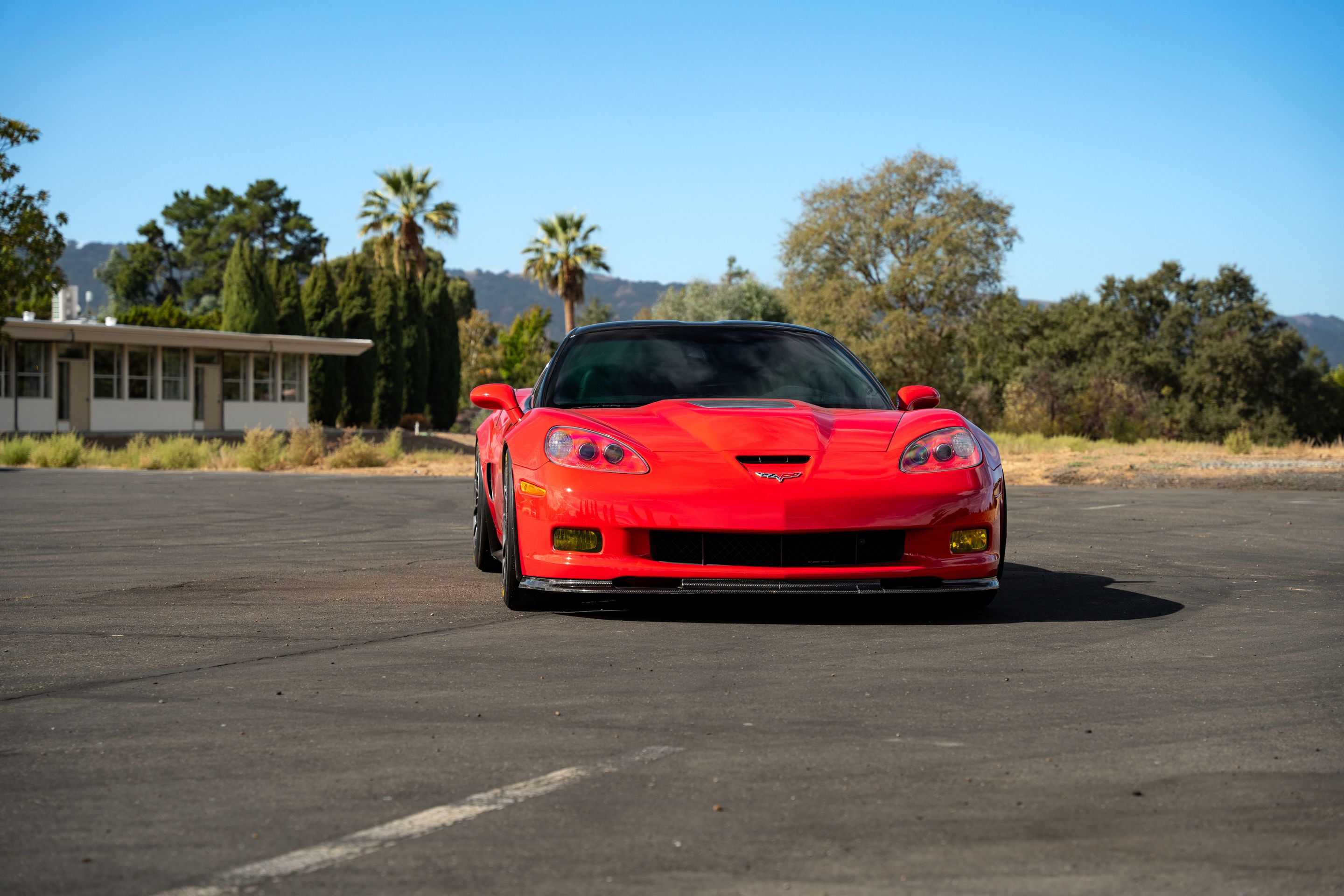 Red Chevrolet C6 Corvette ZR-1 with 18" VS-5RE Apex wheels in Anthracite
