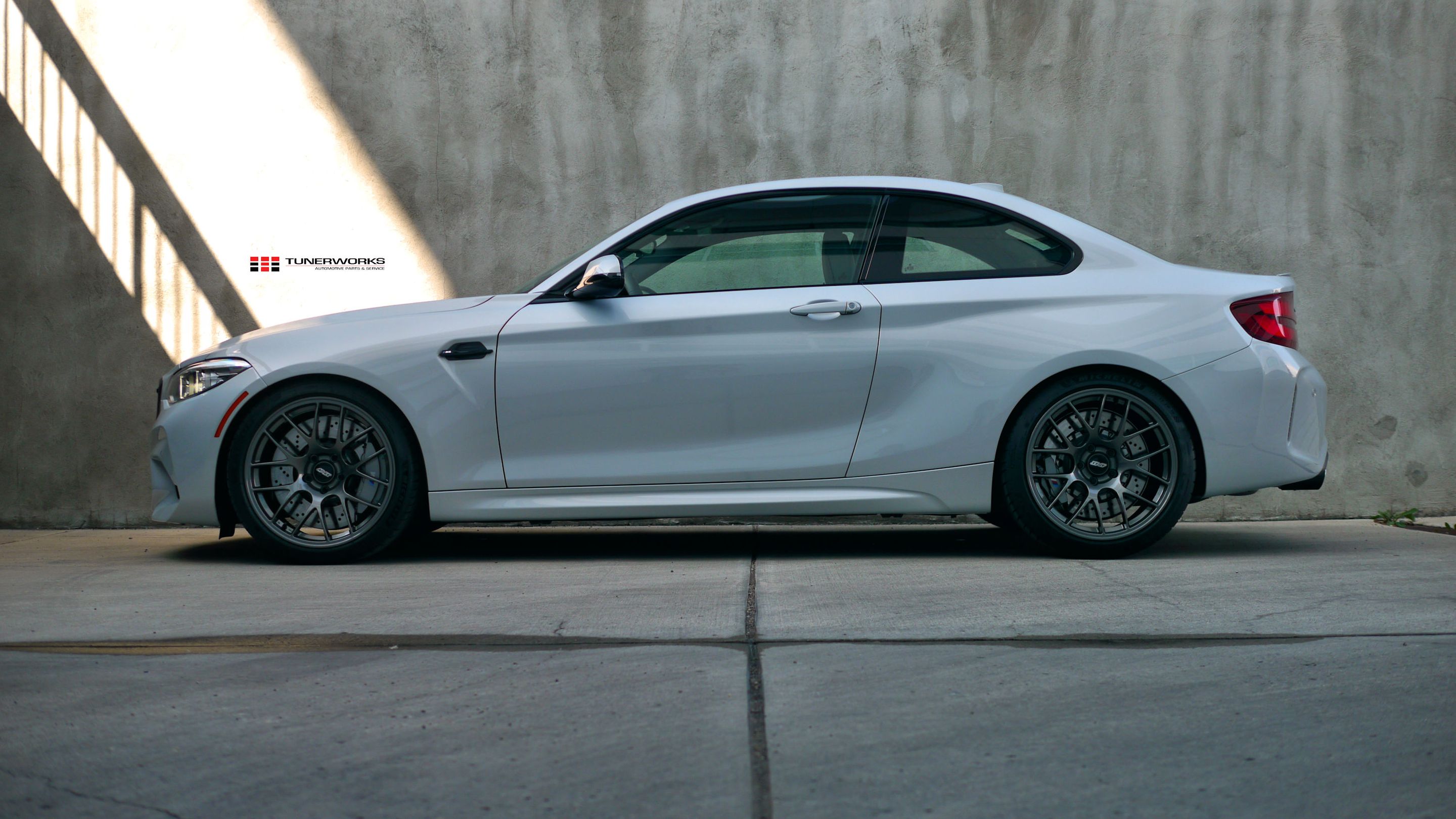 Silver BMW F87 M2 with 19" EC-7 Apex wheels in Anthracite