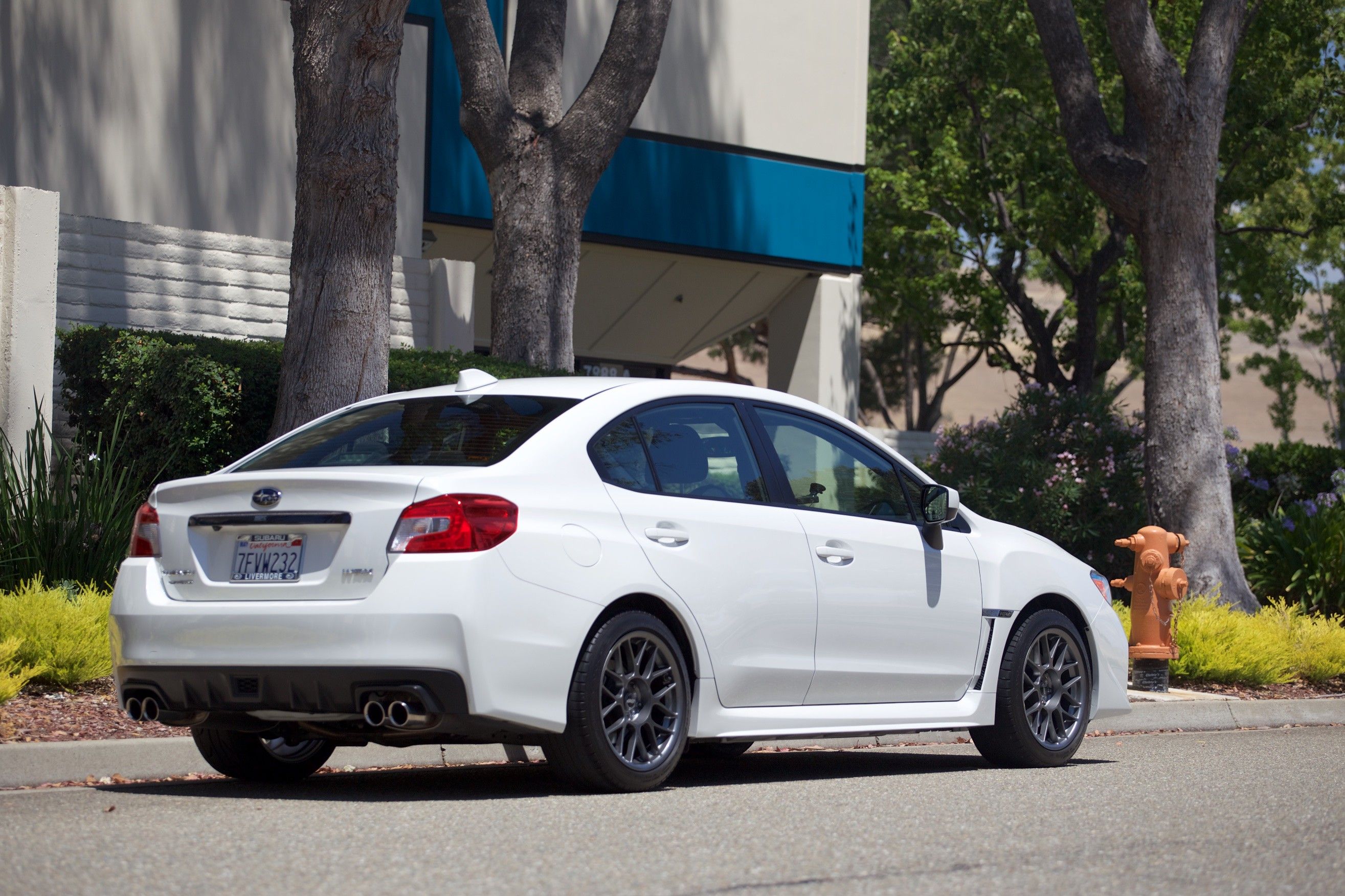 White Subaru VA WRX with 17" ARC-8 Apex wheels in Anthracite