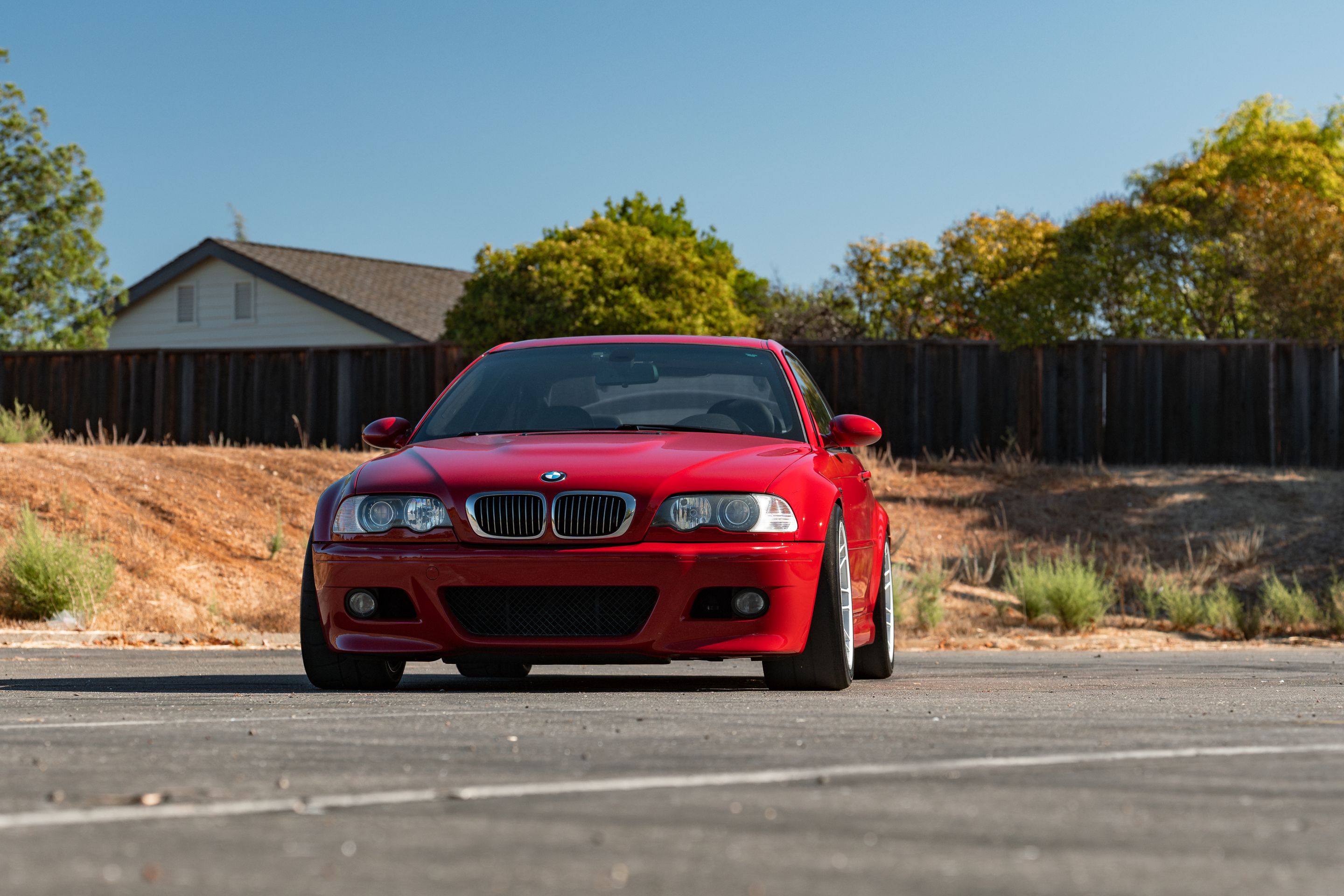 Red BMW E46 M3 with 18" ARC-8RT Apex wheels in Race Silver