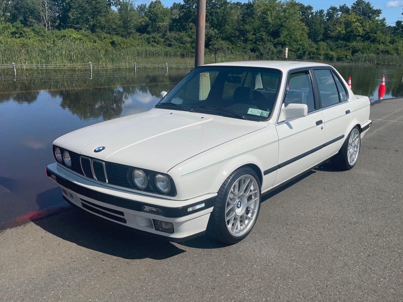 White BMW E30 3 Series with 17" ARC-8 Apex wheels in Race Silver