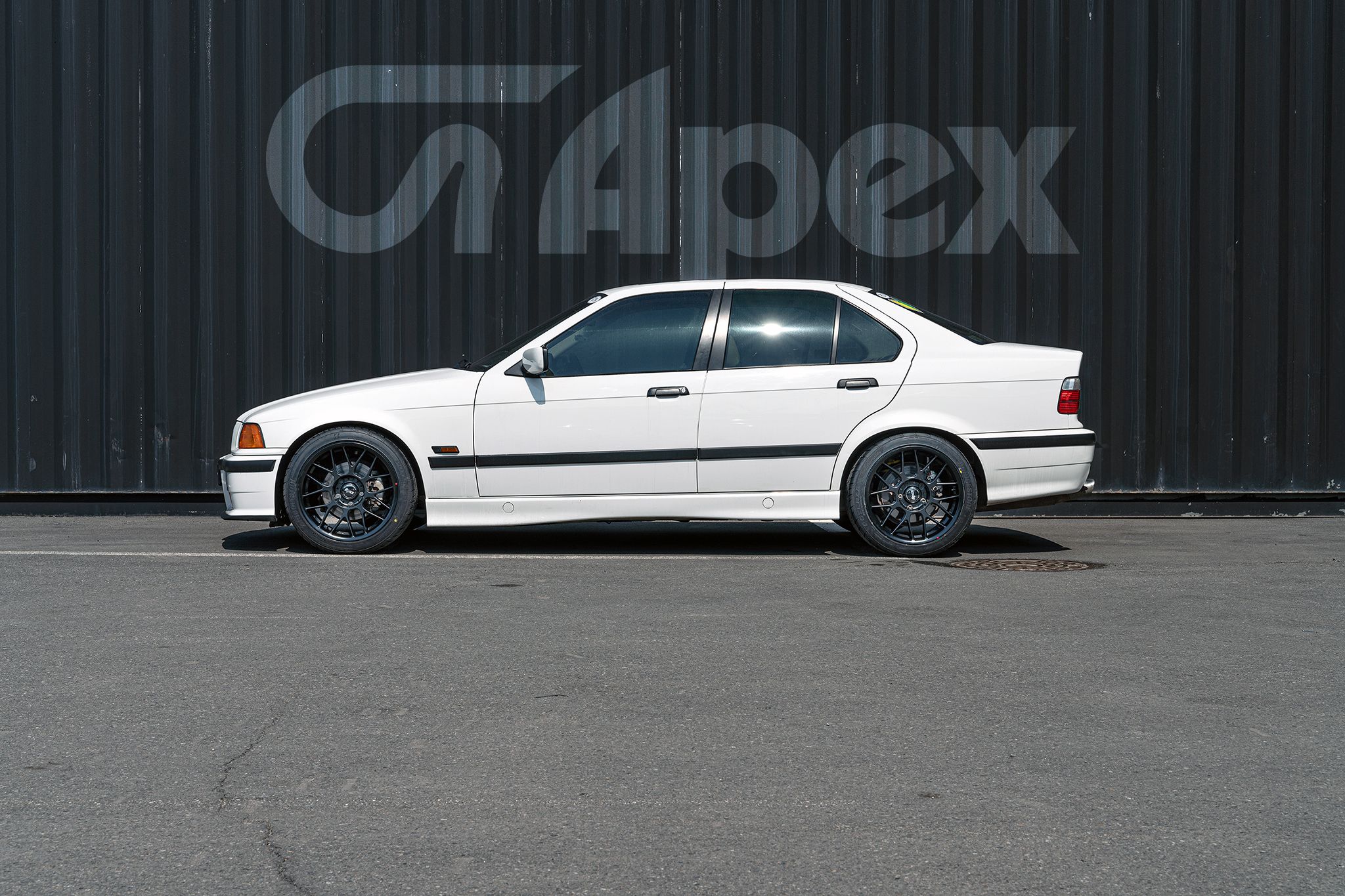 White BMW E36 3 Series with 17" ARC-8 Apex wheels in Satin Black