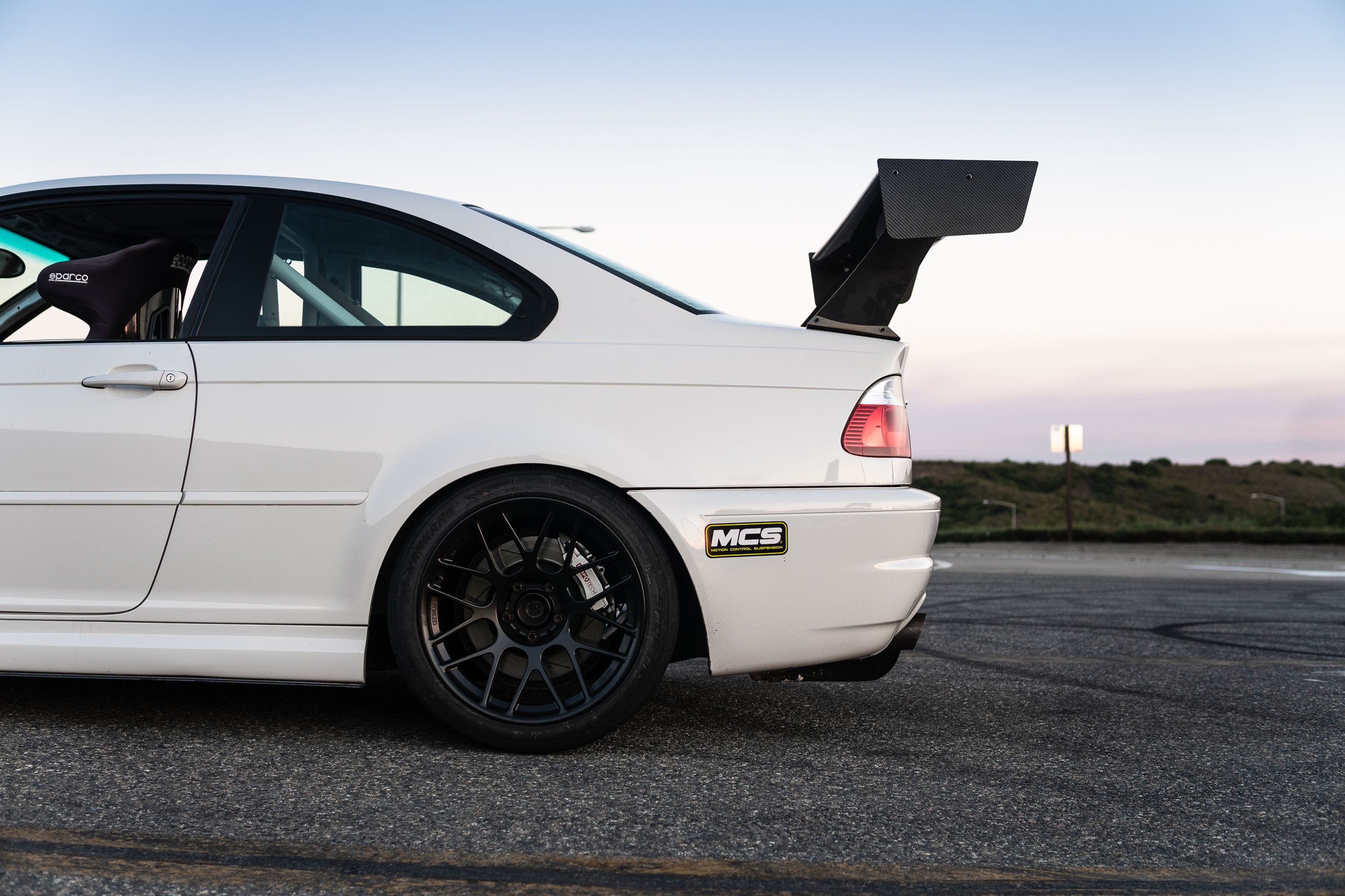 White BMW E46 M3 with 18" ARC-8R Apex wheels in Satin Black