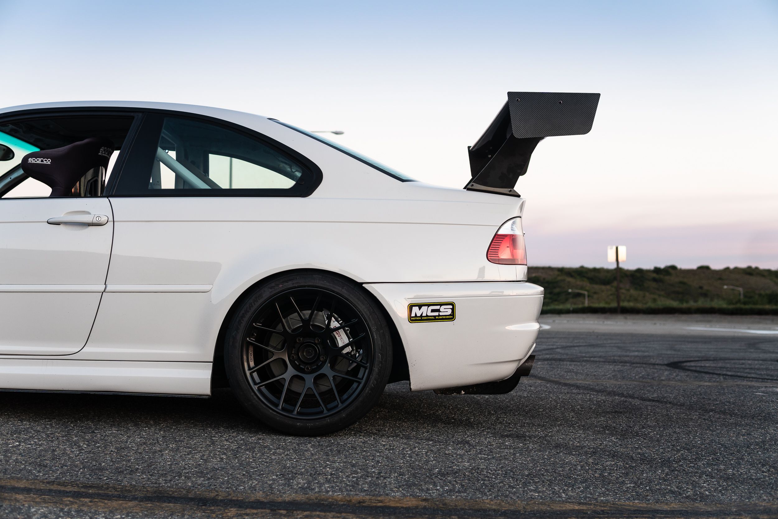 White BMW E46 M3 with 18" ARC-8R Apex wheels in Satin Black