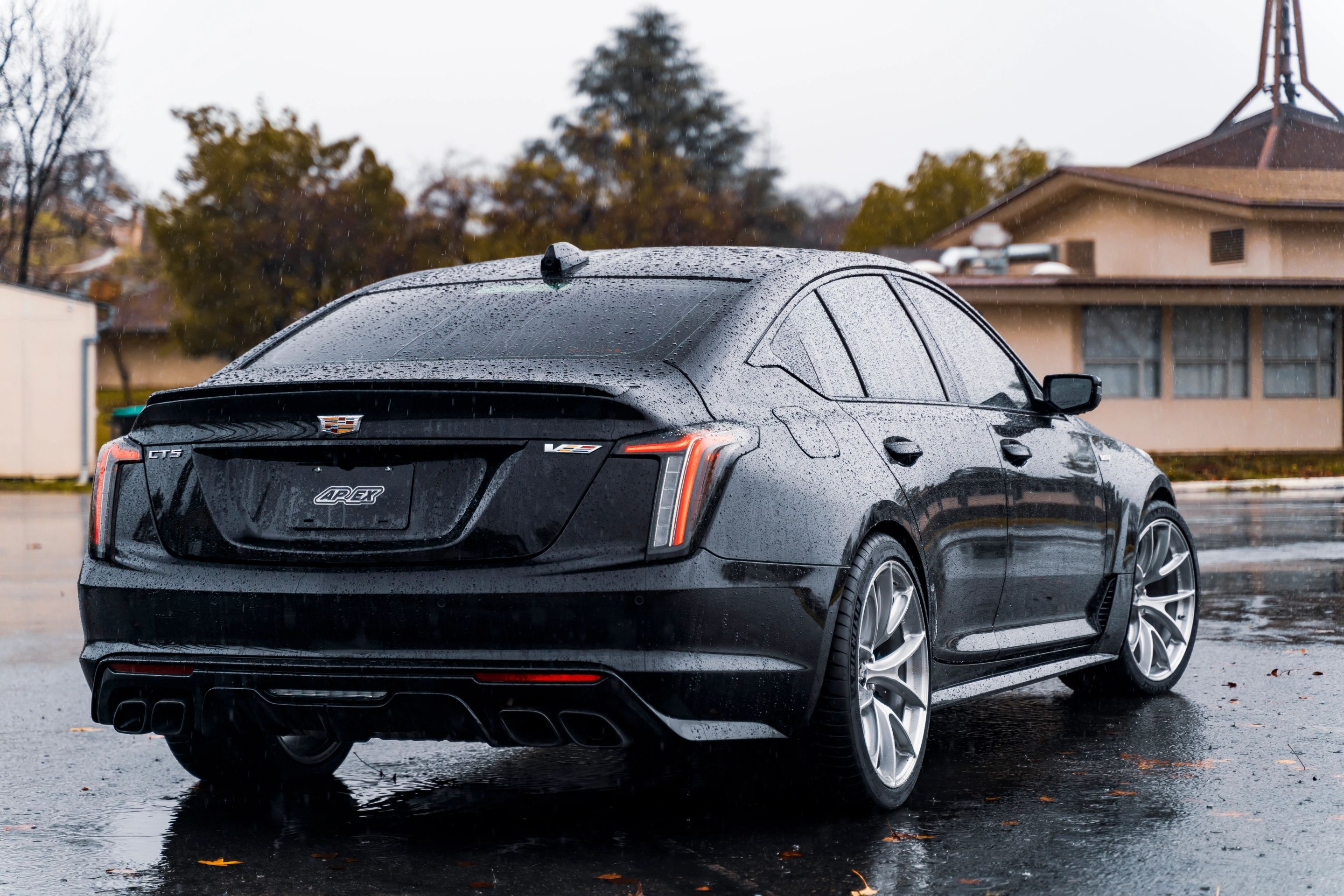 Black Cadillac CT5-V Blackwing with 20" VS-5RS Apex wheels in Brushed Clear