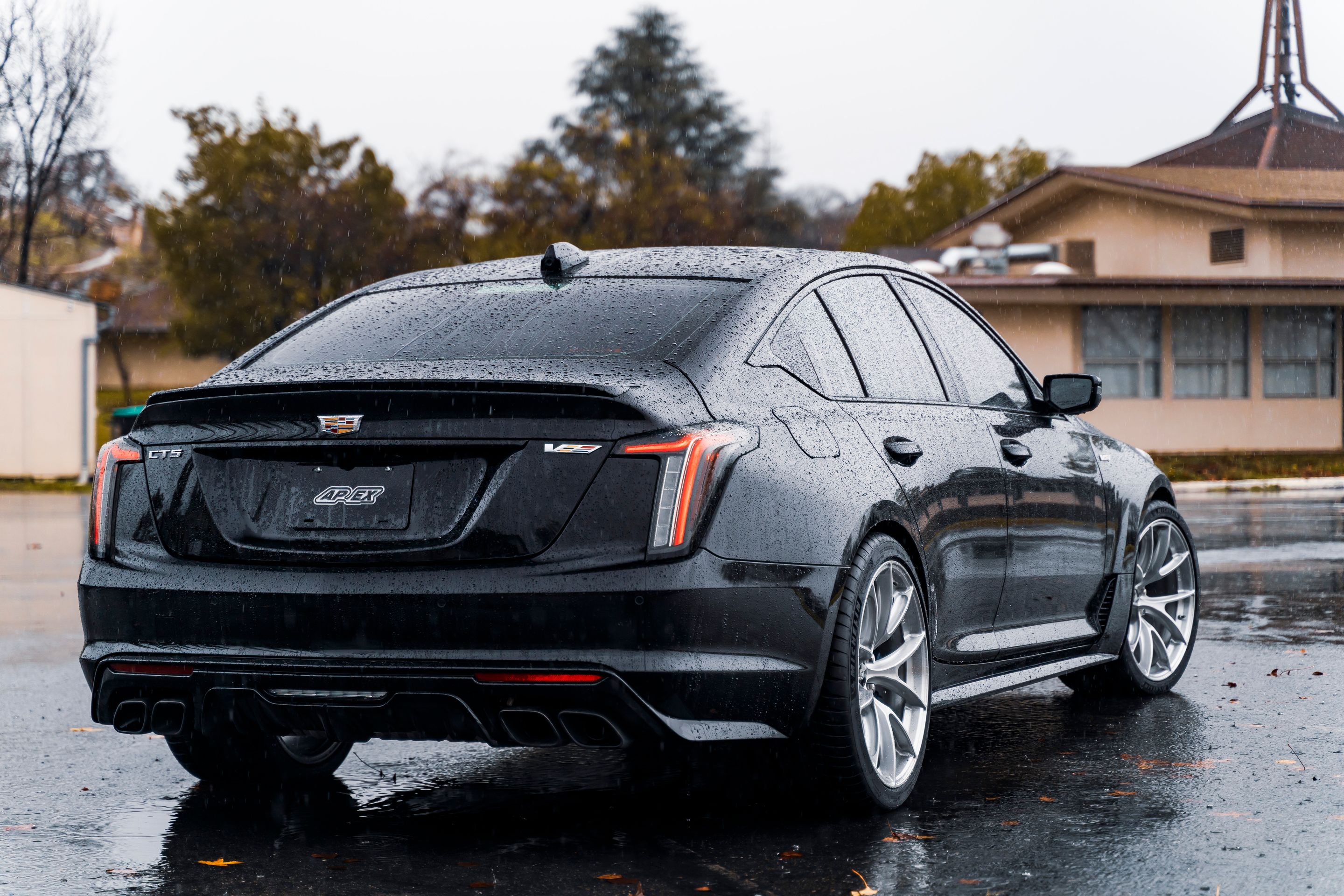 Black Cadillac CT5-V Blackwing with 20" VS-5RS Apex wheels in Brushed Clear