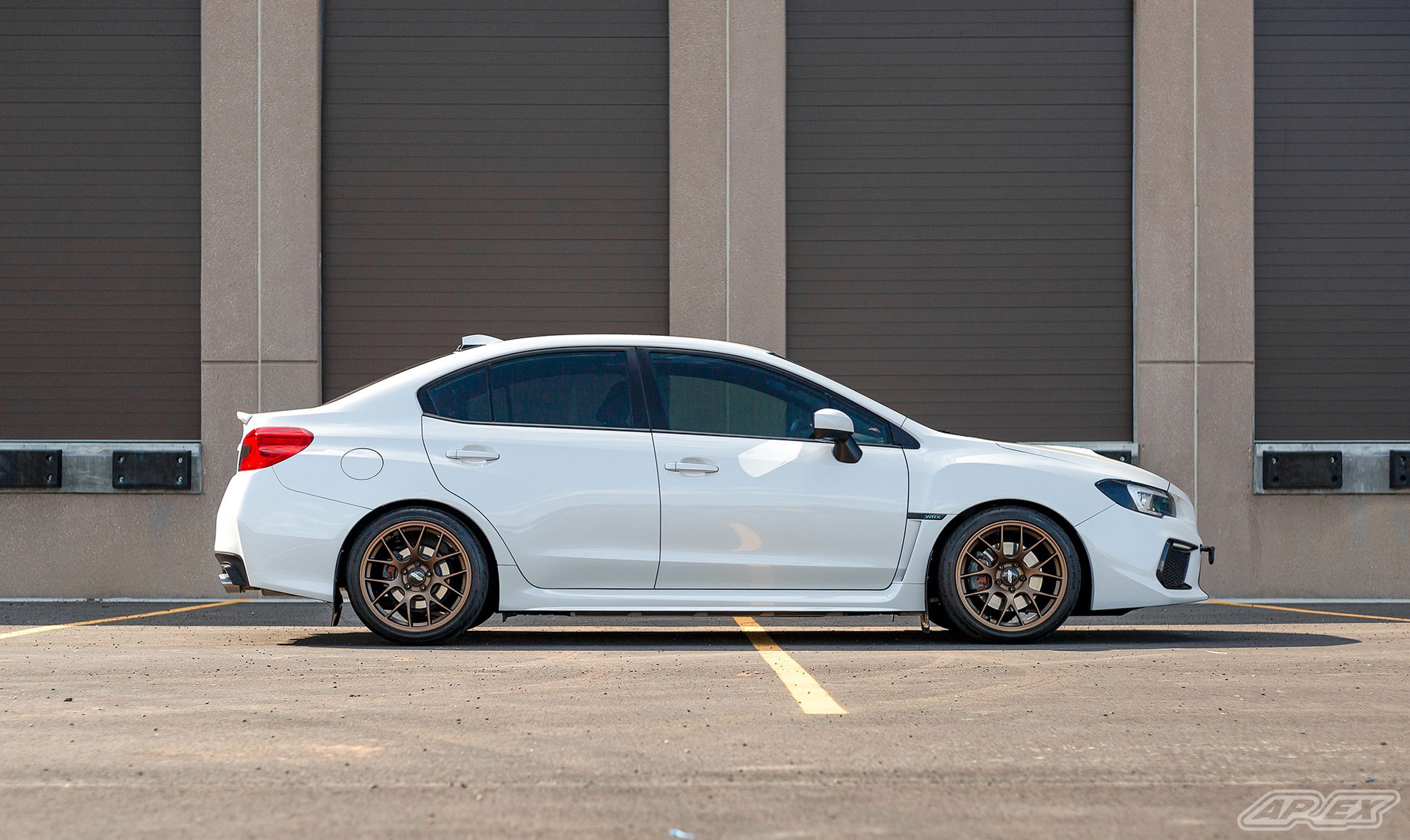 White Subaru VA WRX with 18" EC-7 Apex wheels in Satin Bronze