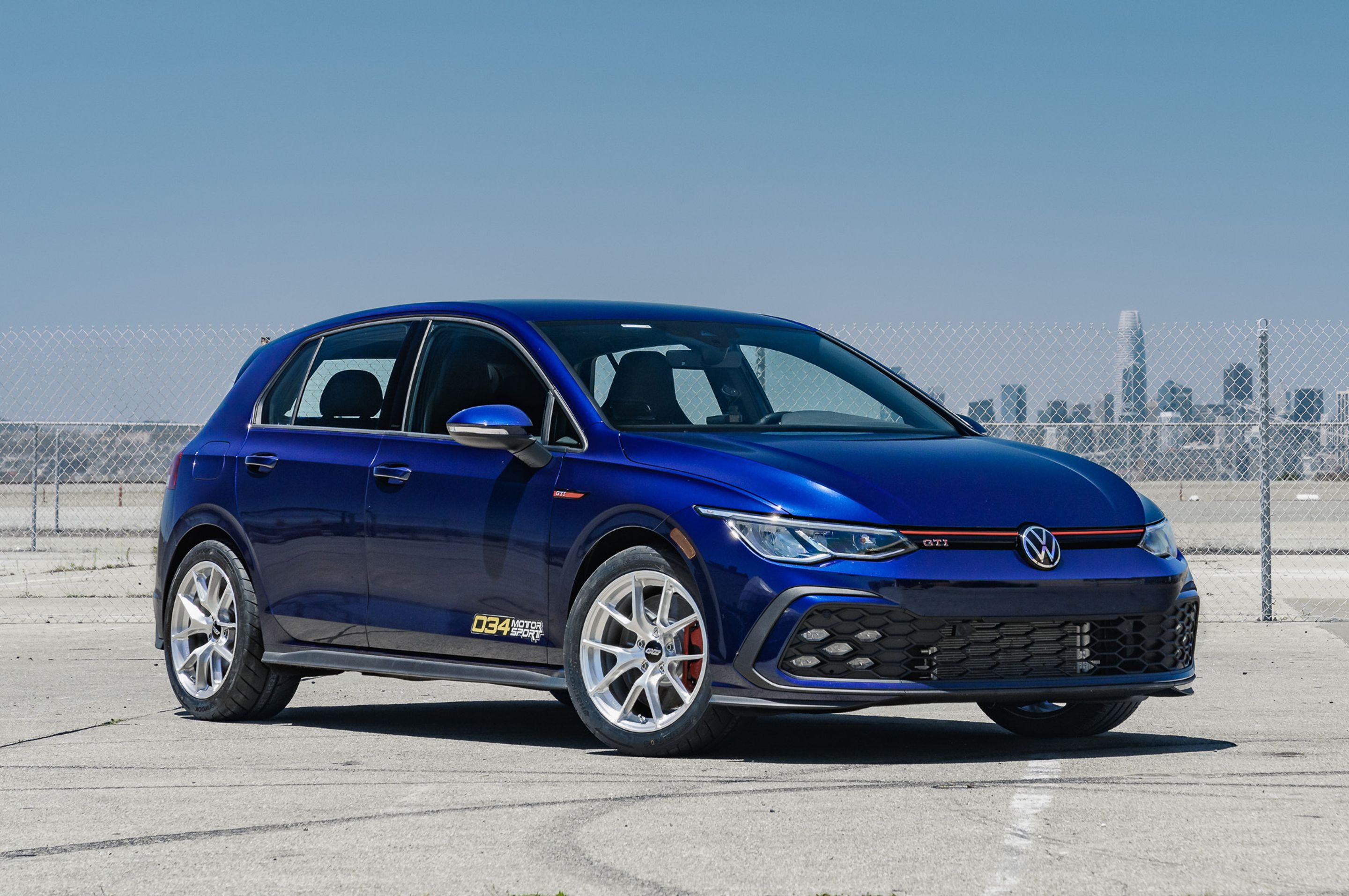 Blue VW MK8 GTI with 17" VS-5RS Apex wheels in Brushed Clear