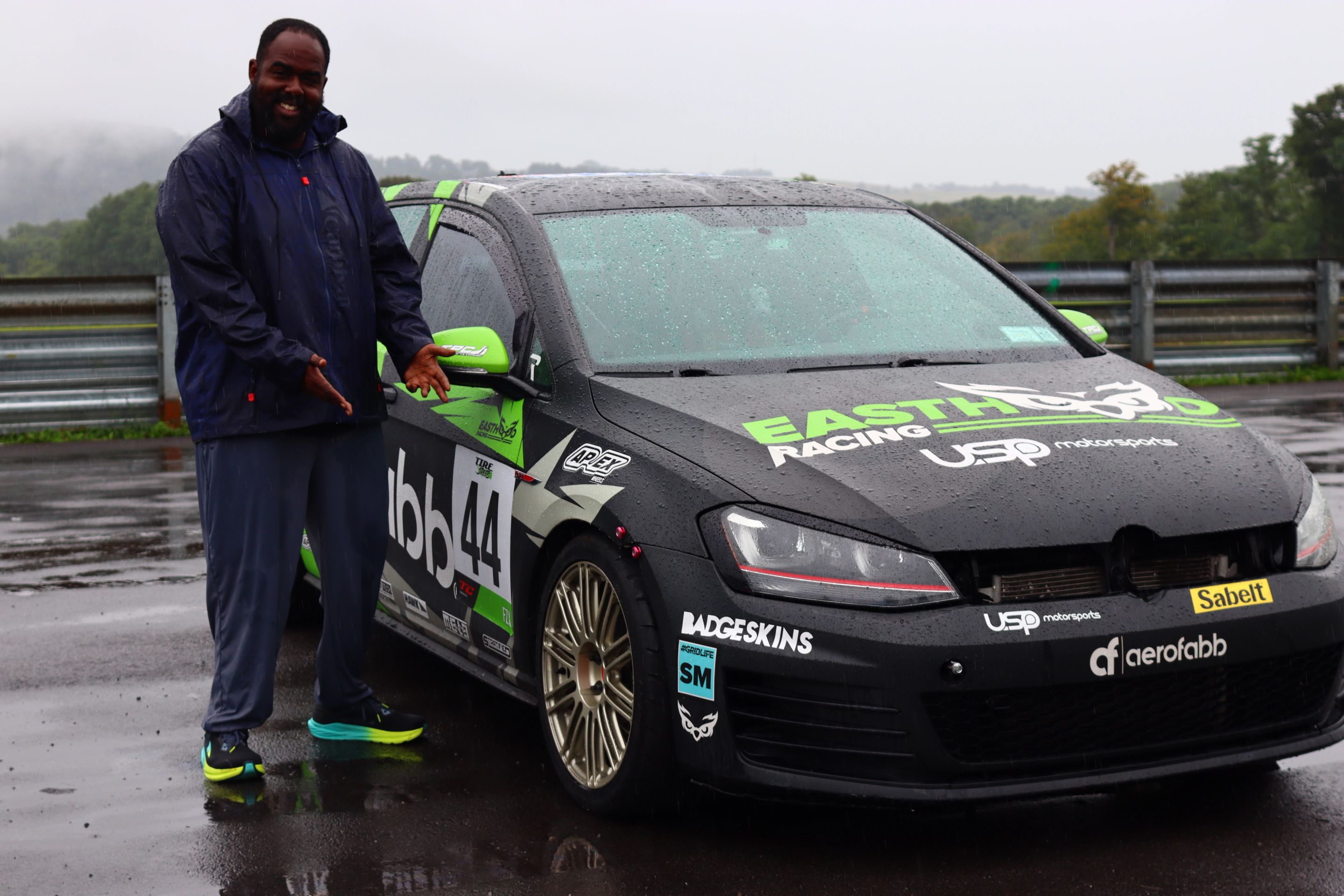 Race Livery VW MK7 GTI with 18" TC-10RT Apex wheels in Motorsport Gold