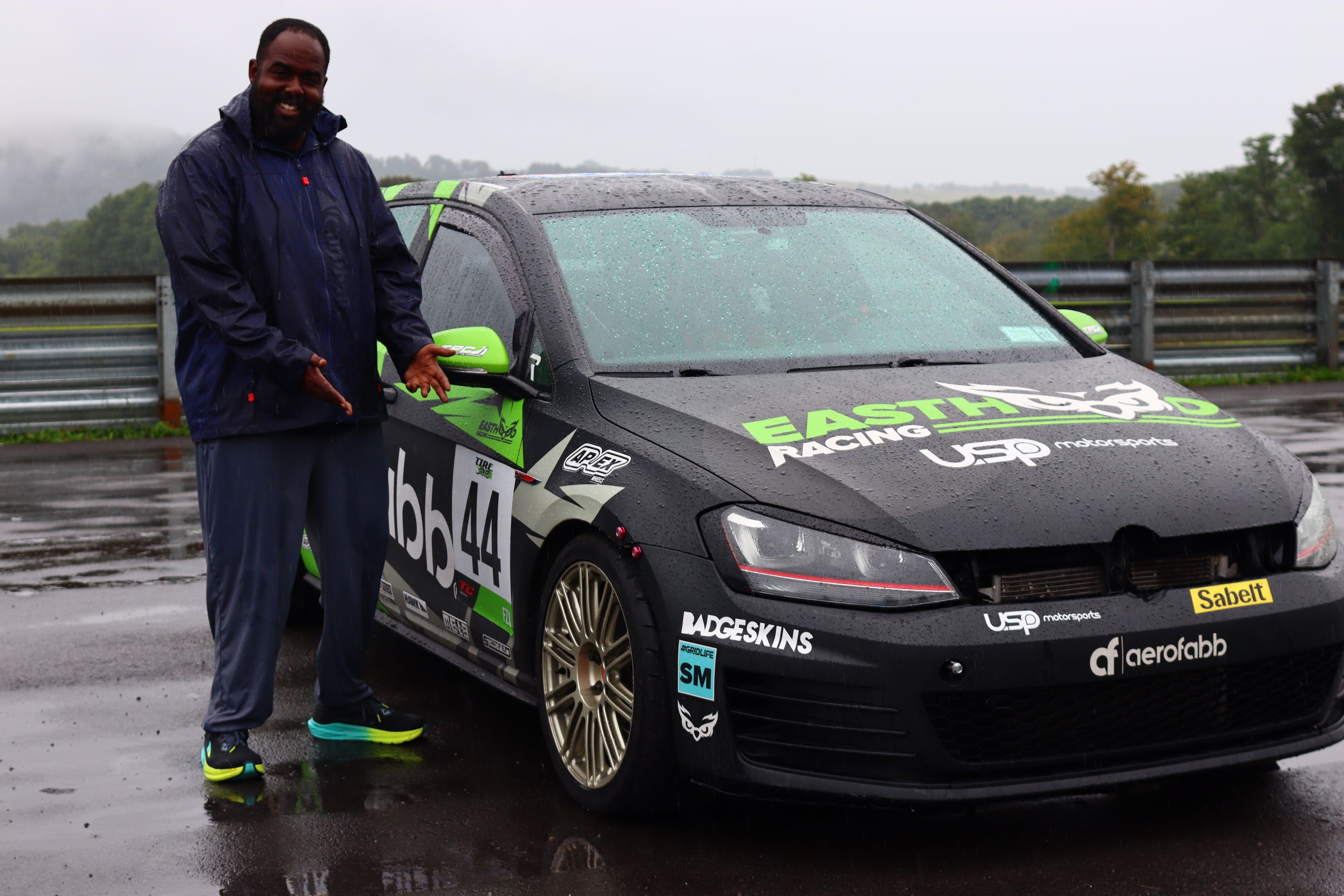 Race Livery VW MK7 GTI with 18" TC-10RT Apex wheels in Motorsport Gold