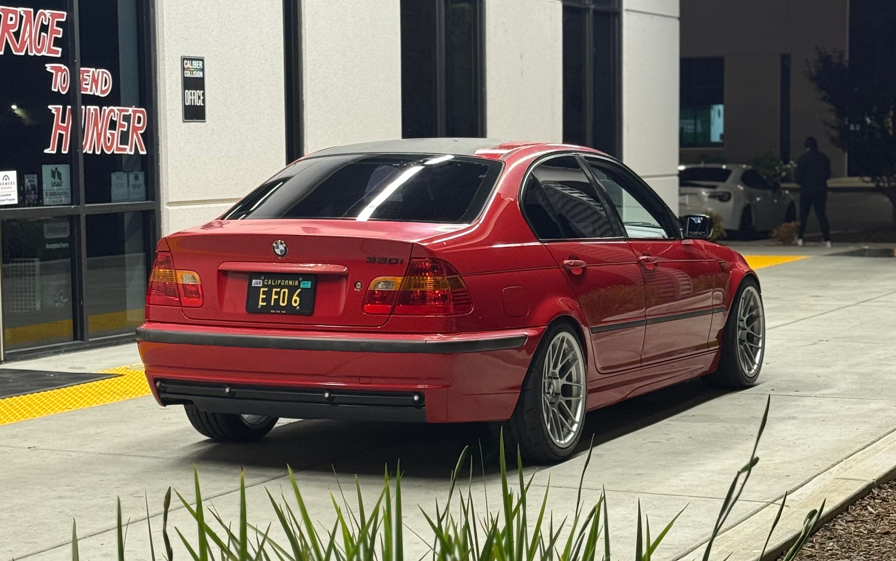 Red BMW E46 3 Series with 18" ARC-8RT Apex wheels in Race Silver