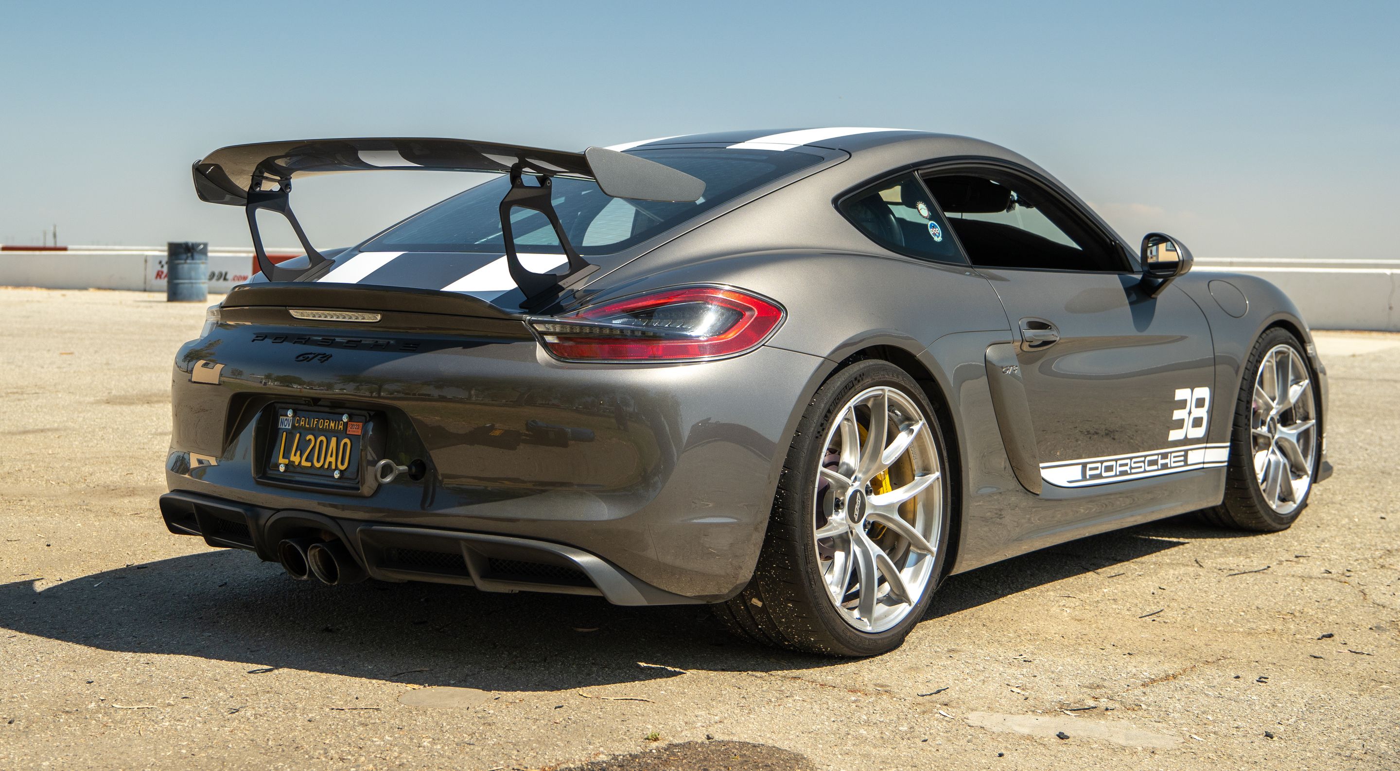 Grey Porsche 981 Cayman GT4 with 20" VS-5RS Apex wheels in Brushed Clear