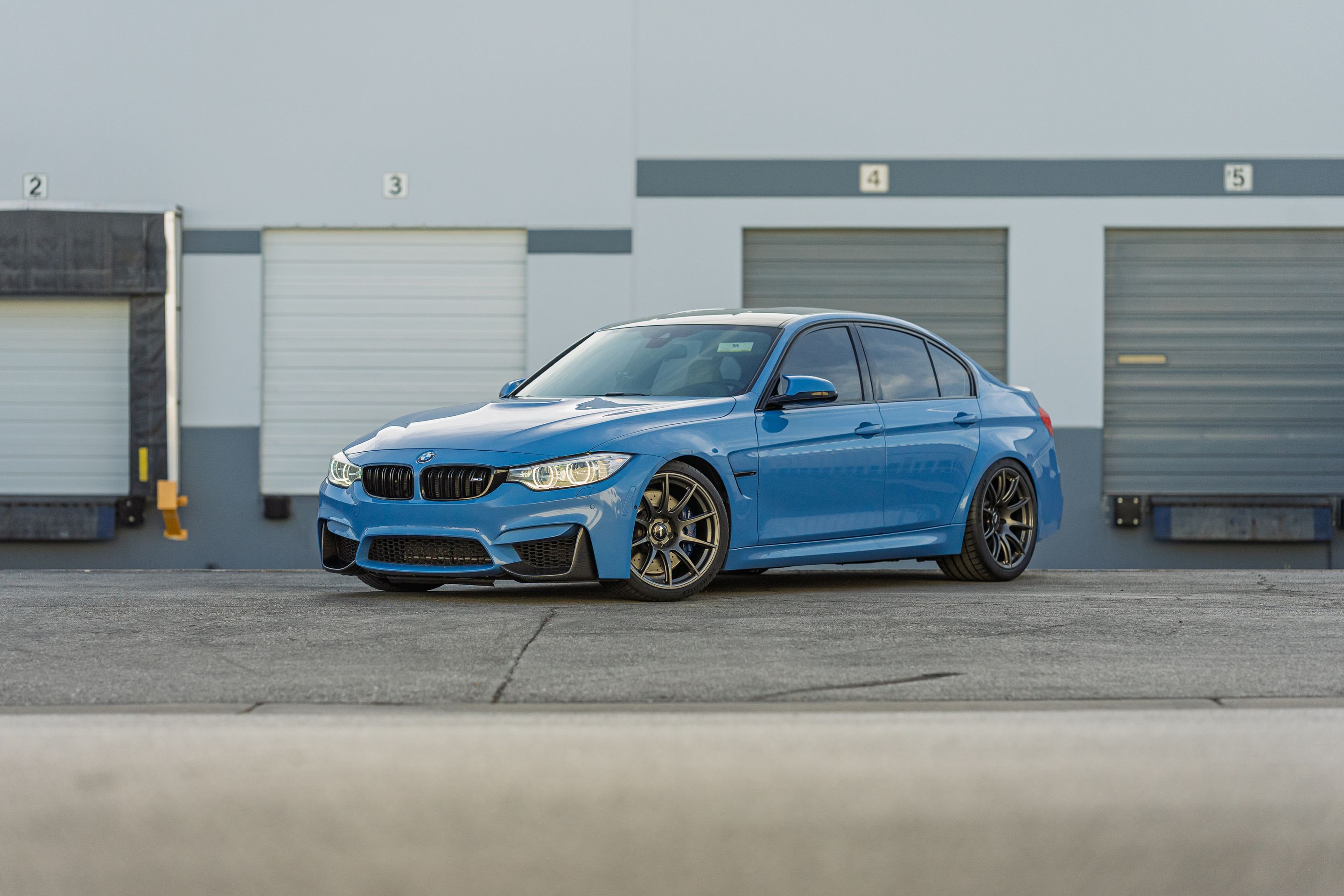 Blue BMW F80 M3 with 19" SM-10 Apex wheels in Anthracite
