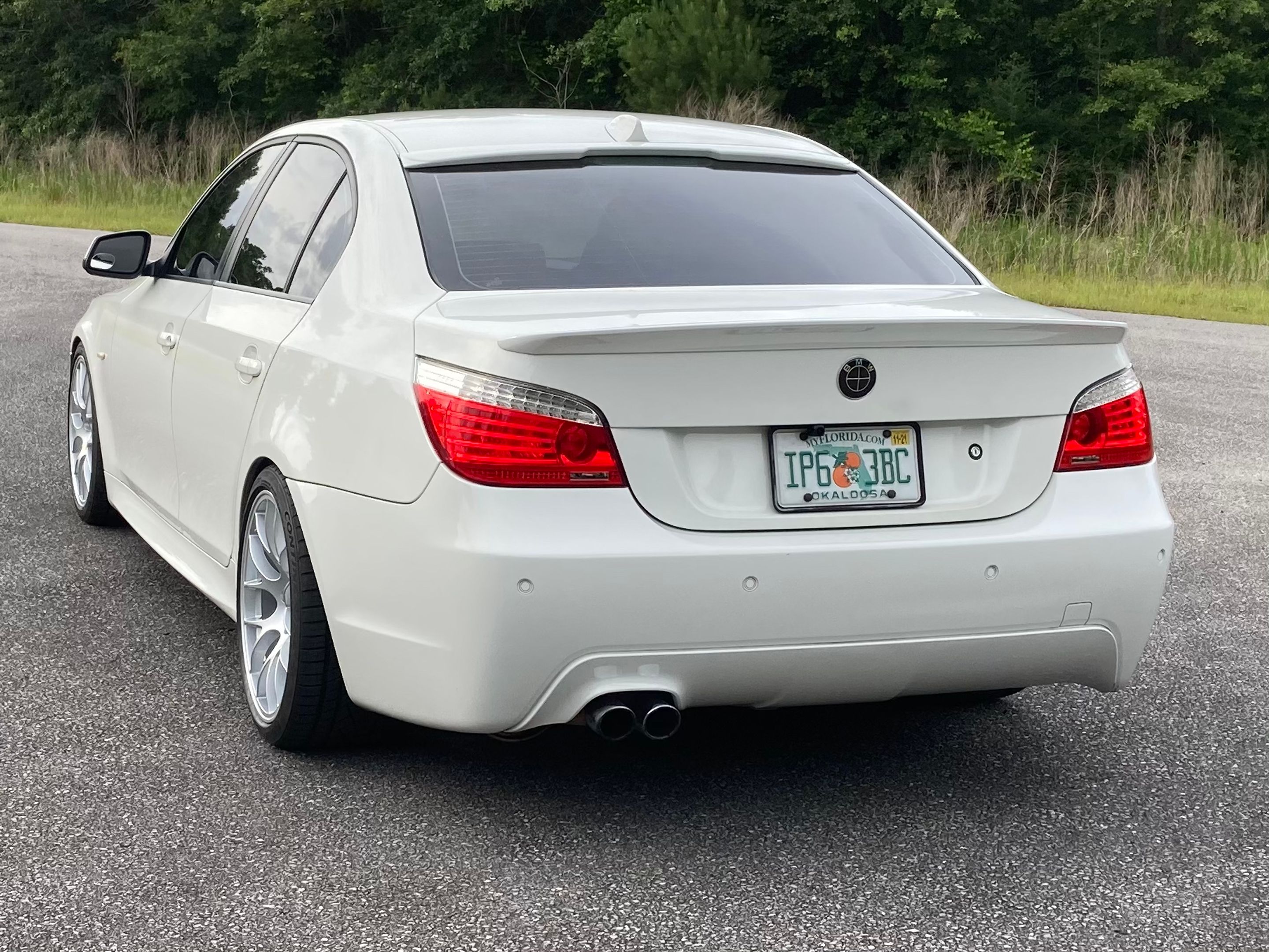 White BMW E60 Sedan 5 Series with 19" EC-7 Apex wheels in Race Silver