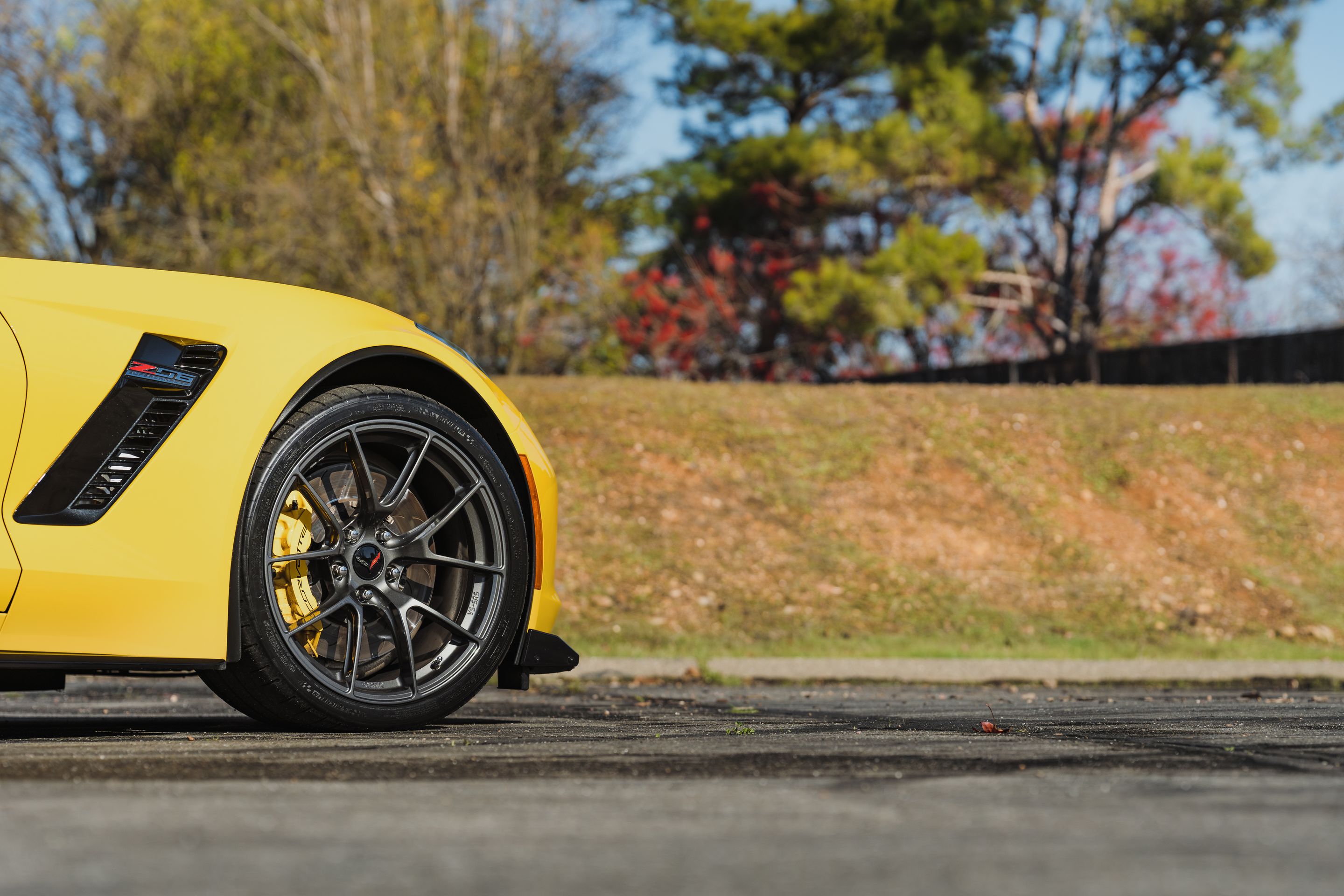 Yellow Chevrolet C7 Corvette Z06 with 19"/20" VS-5RS Apex wheels in Anthracite