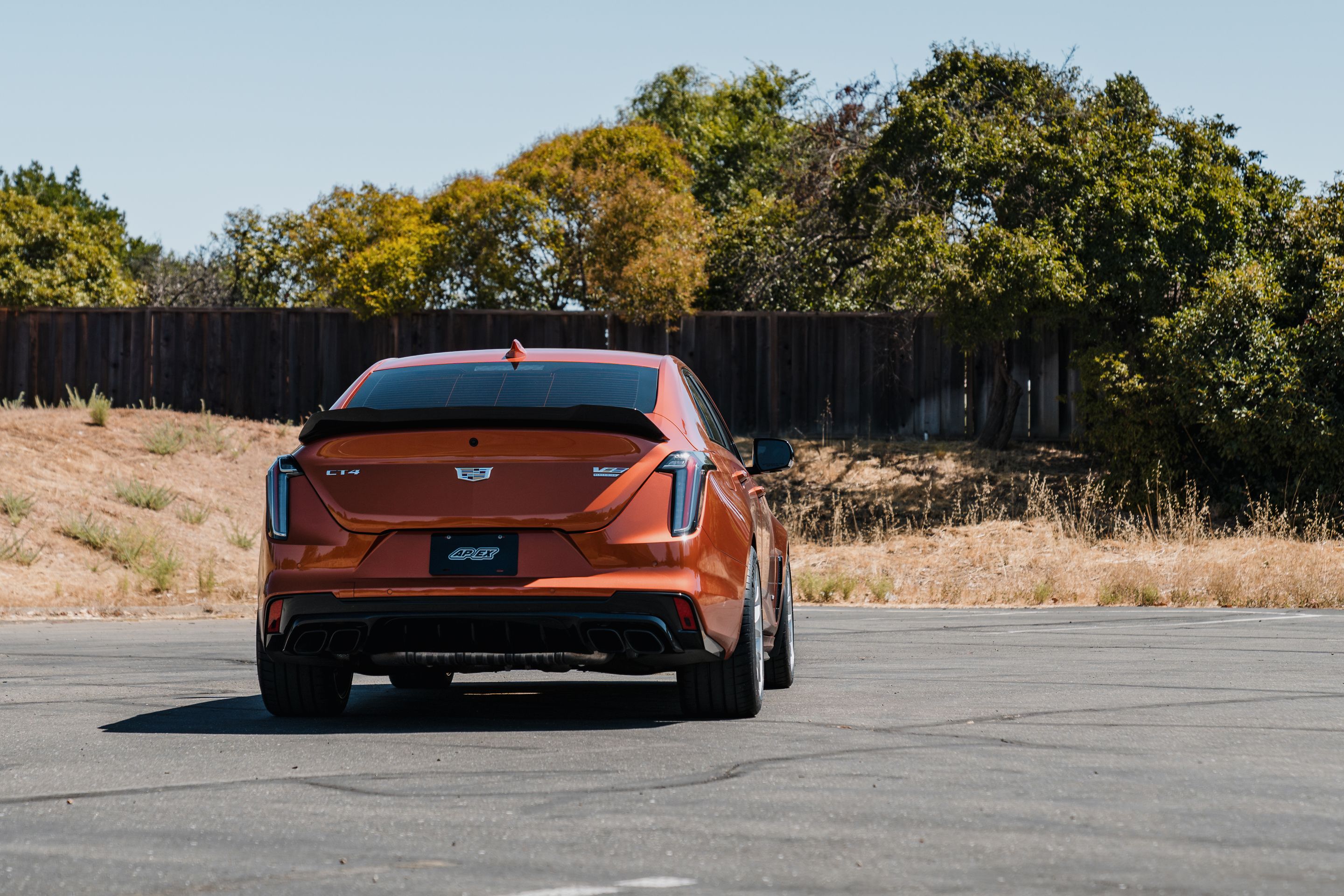 Orange Cadillac CT4-V Blackwing with 18" EC-7 Apex wheels in Race Silver