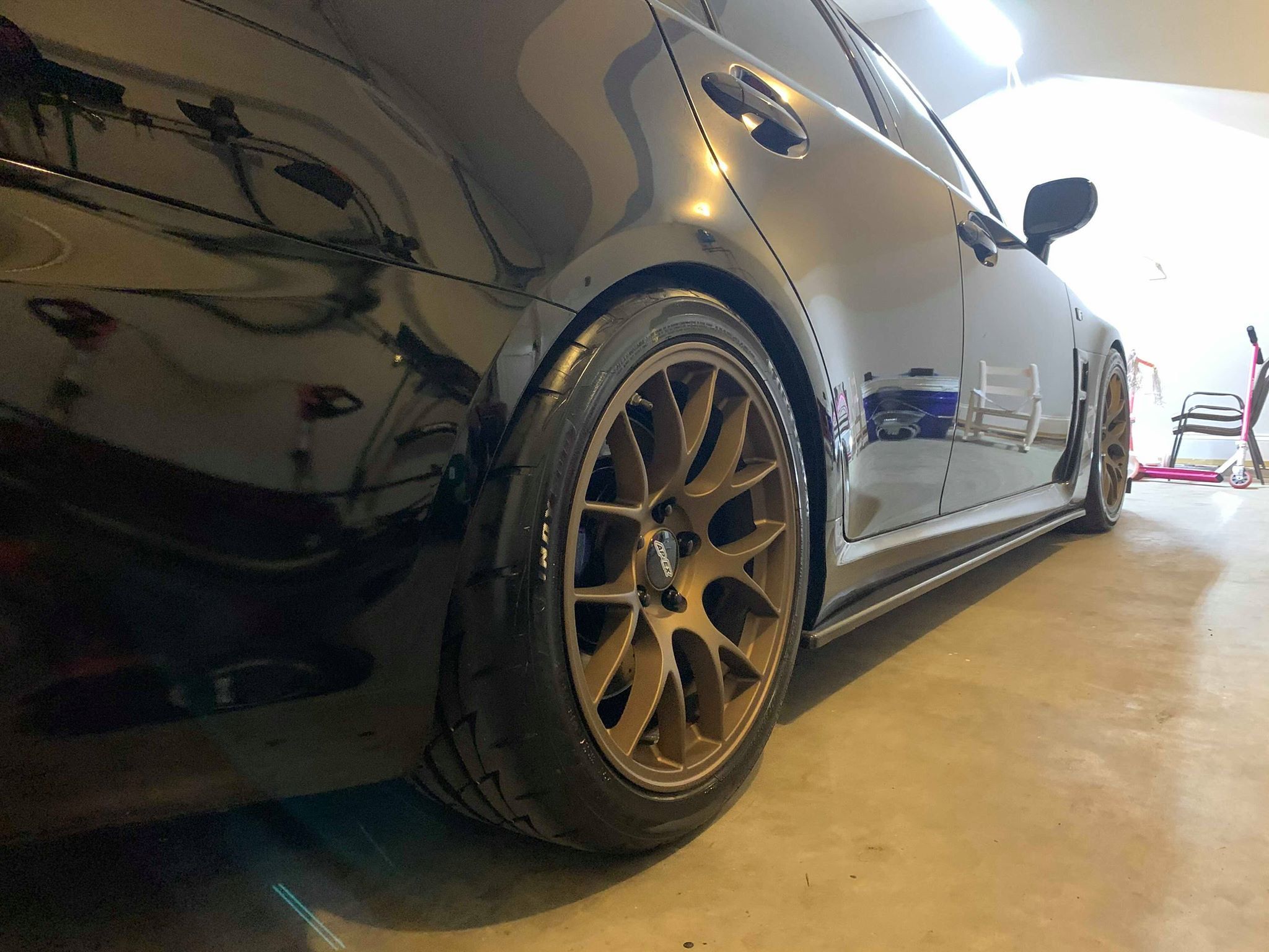 Black Lexus USE20 IS-F with 18" EC-7 Apex wheels in Satin Bronze