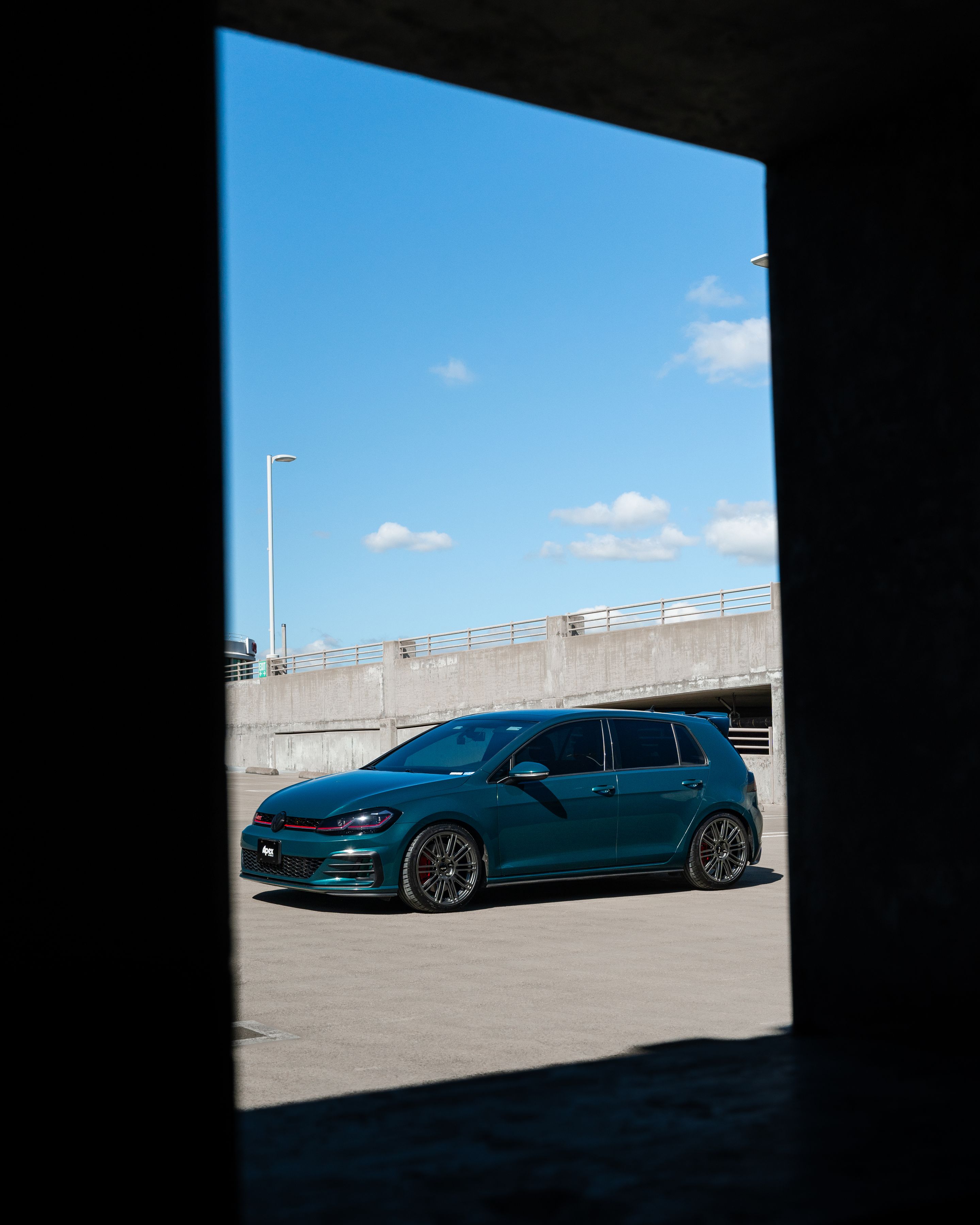 Green VW MK7 GTI with 18" TC-10RT Apex wheels in Anthracite
