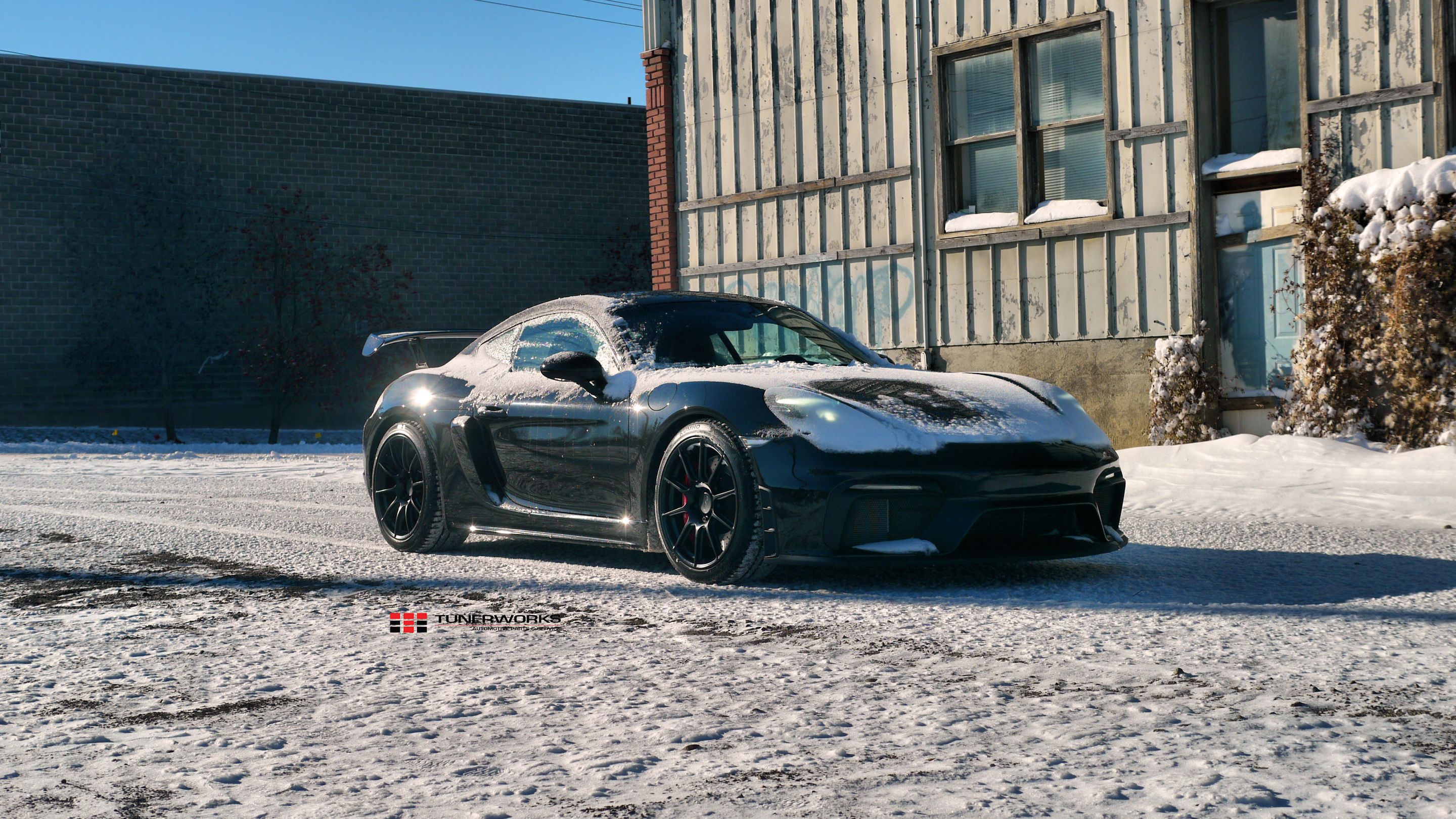 Black Porsche 718 Cayman GT4 with 19" SM-10 Apex wheels in Satin Black