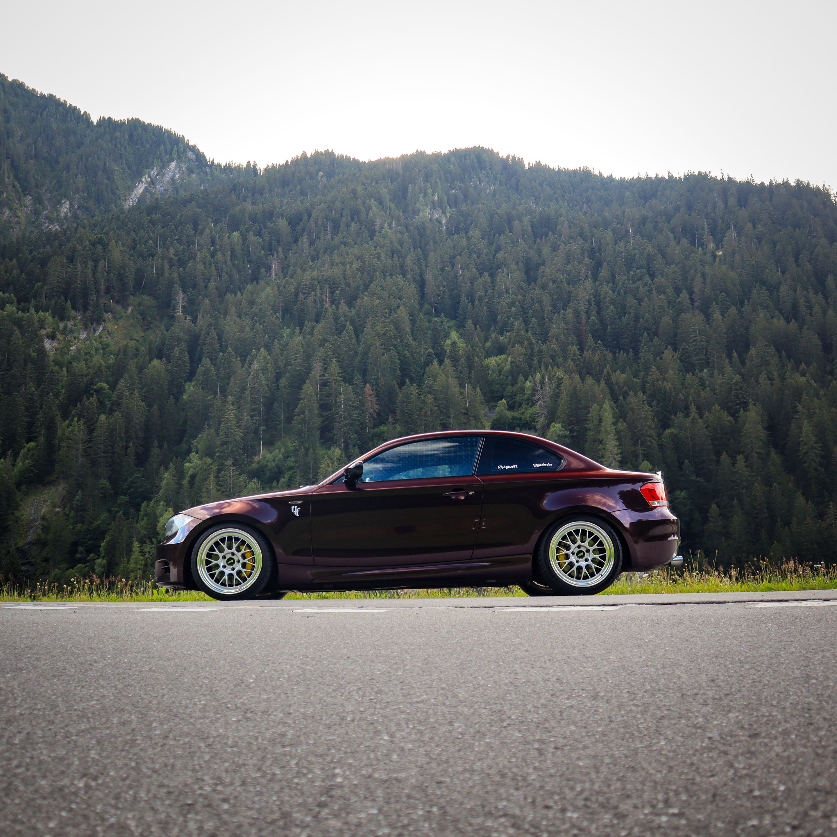 Red BMW E82 Coupe 1 Series with 18" ML-10RT Apex wheels in Machined Lip Race Silver
