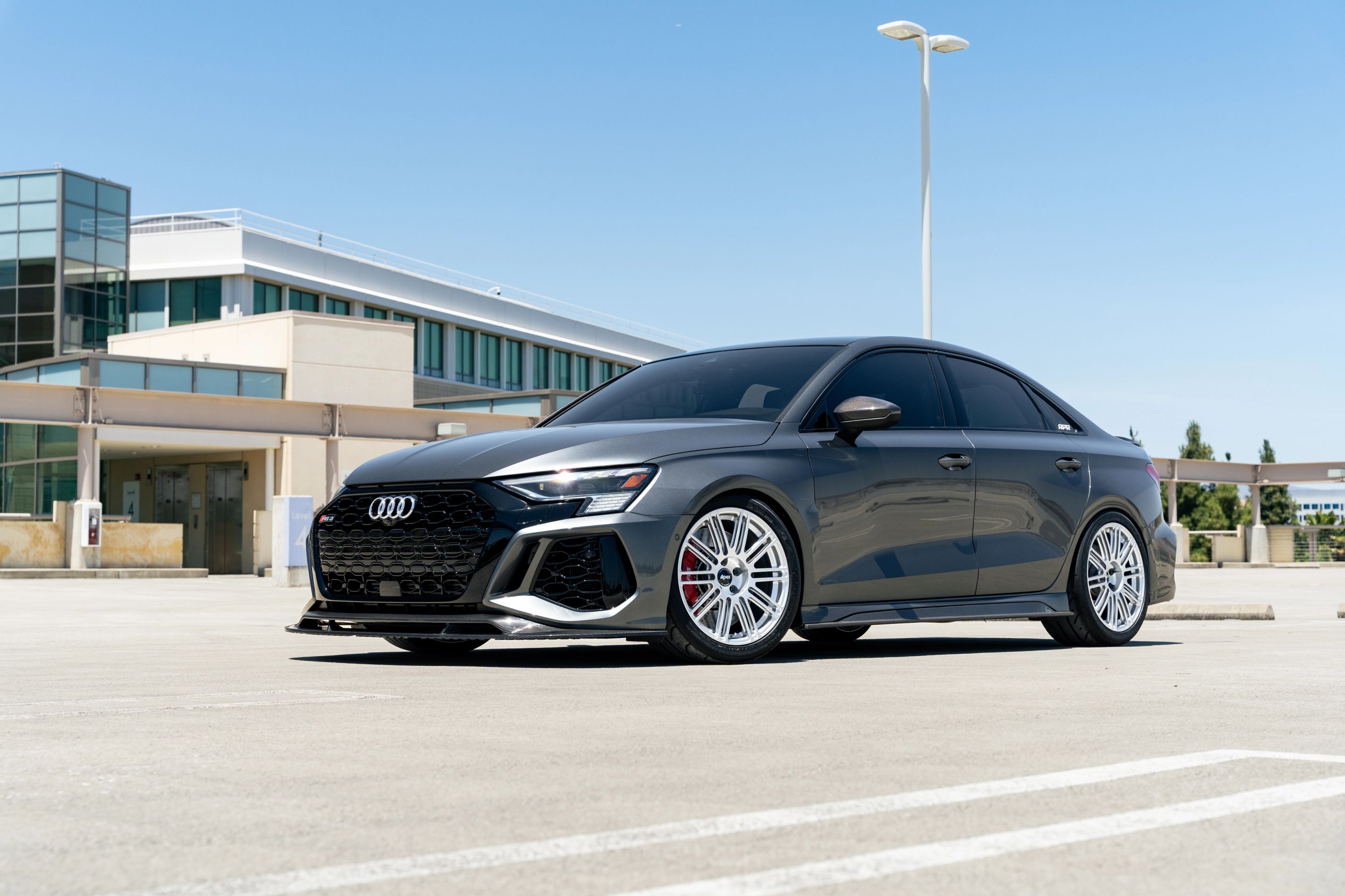 Grey Audi 8Y RS 3 with 18" TC-10RT Apex wheels in Race Silver