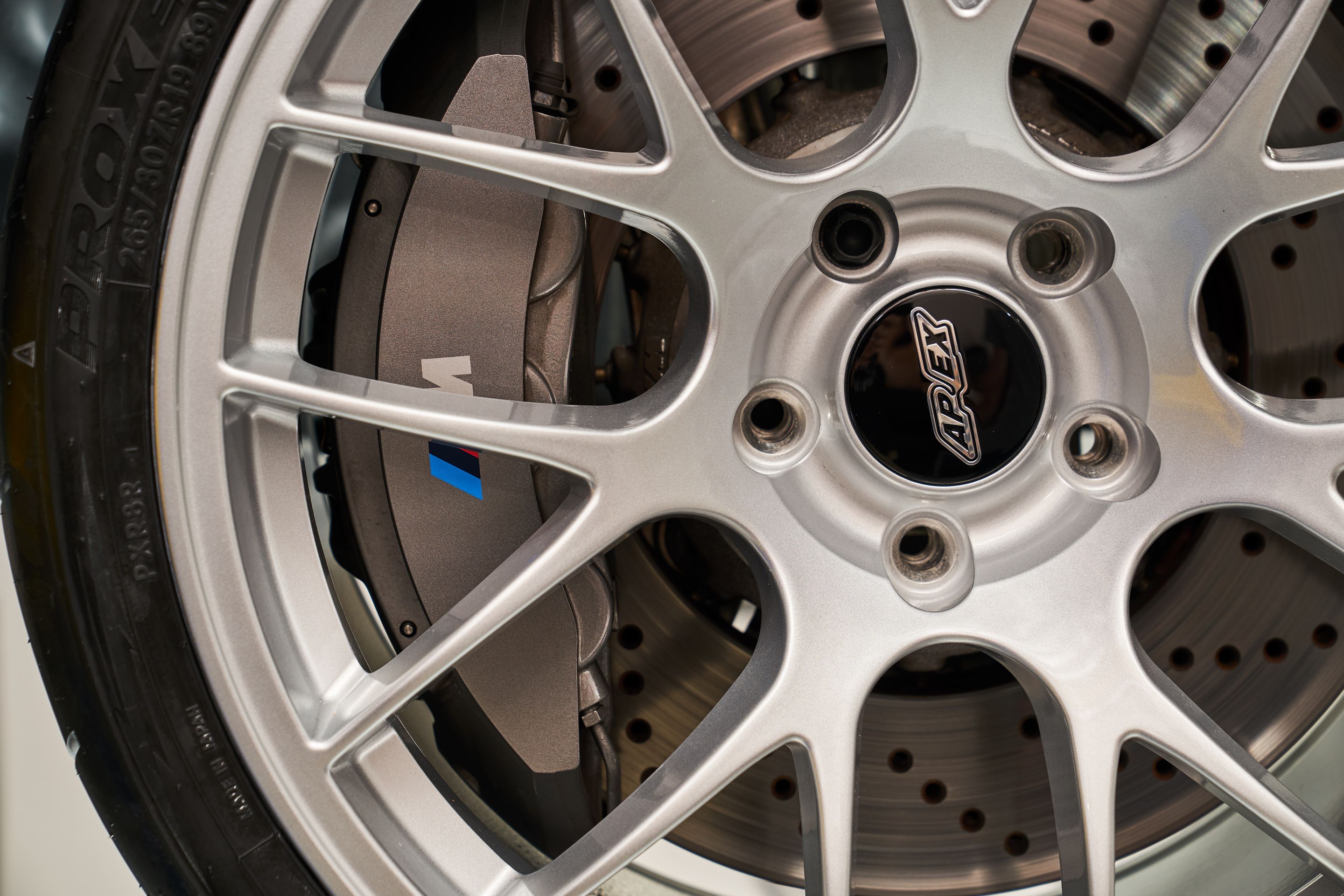 Blue BMW F87 M2 with 19" EC-7 Apex wheels in Race Silver