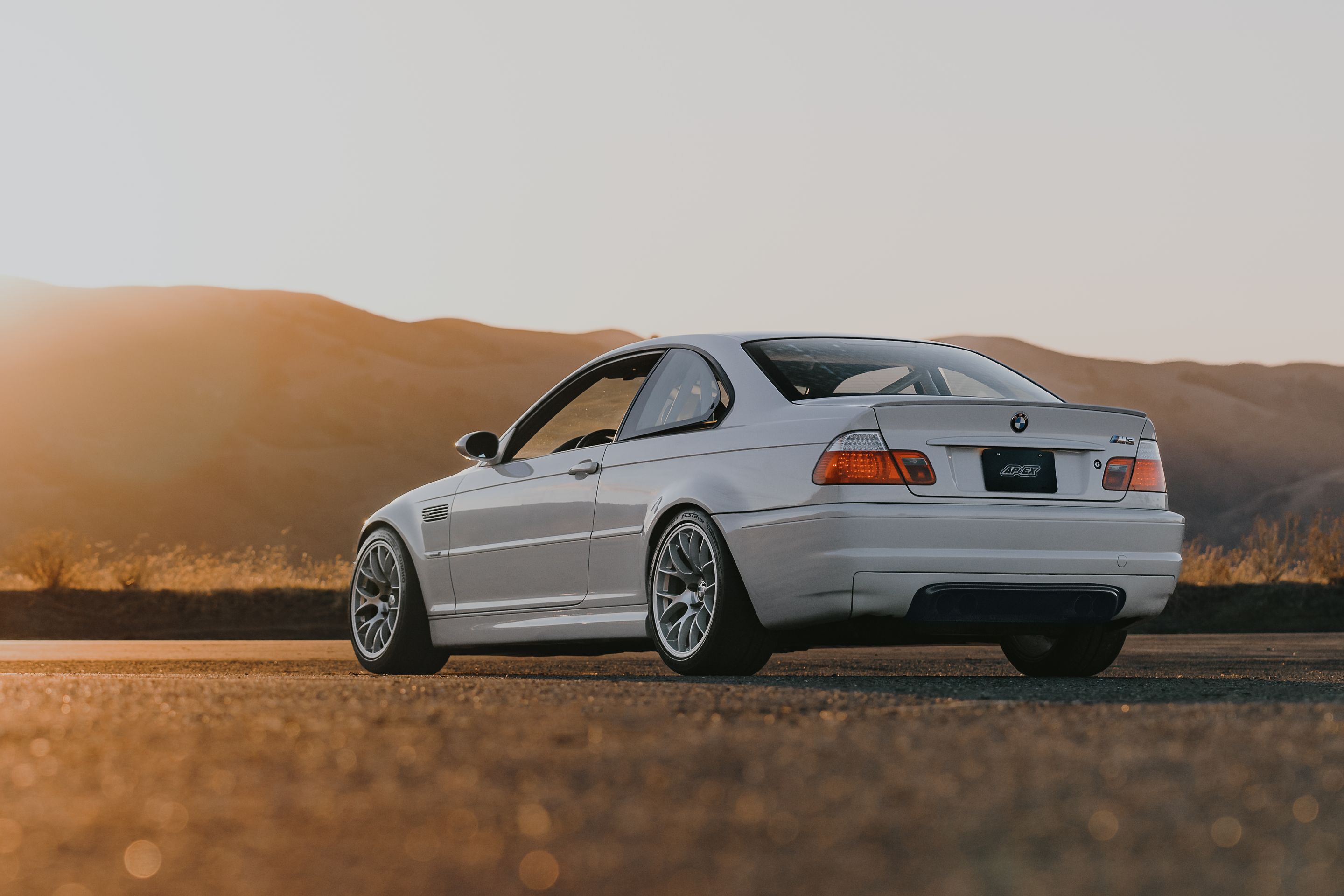 White BMW E46 M3 with 18" EC-7 Apex wheels in Race Silver