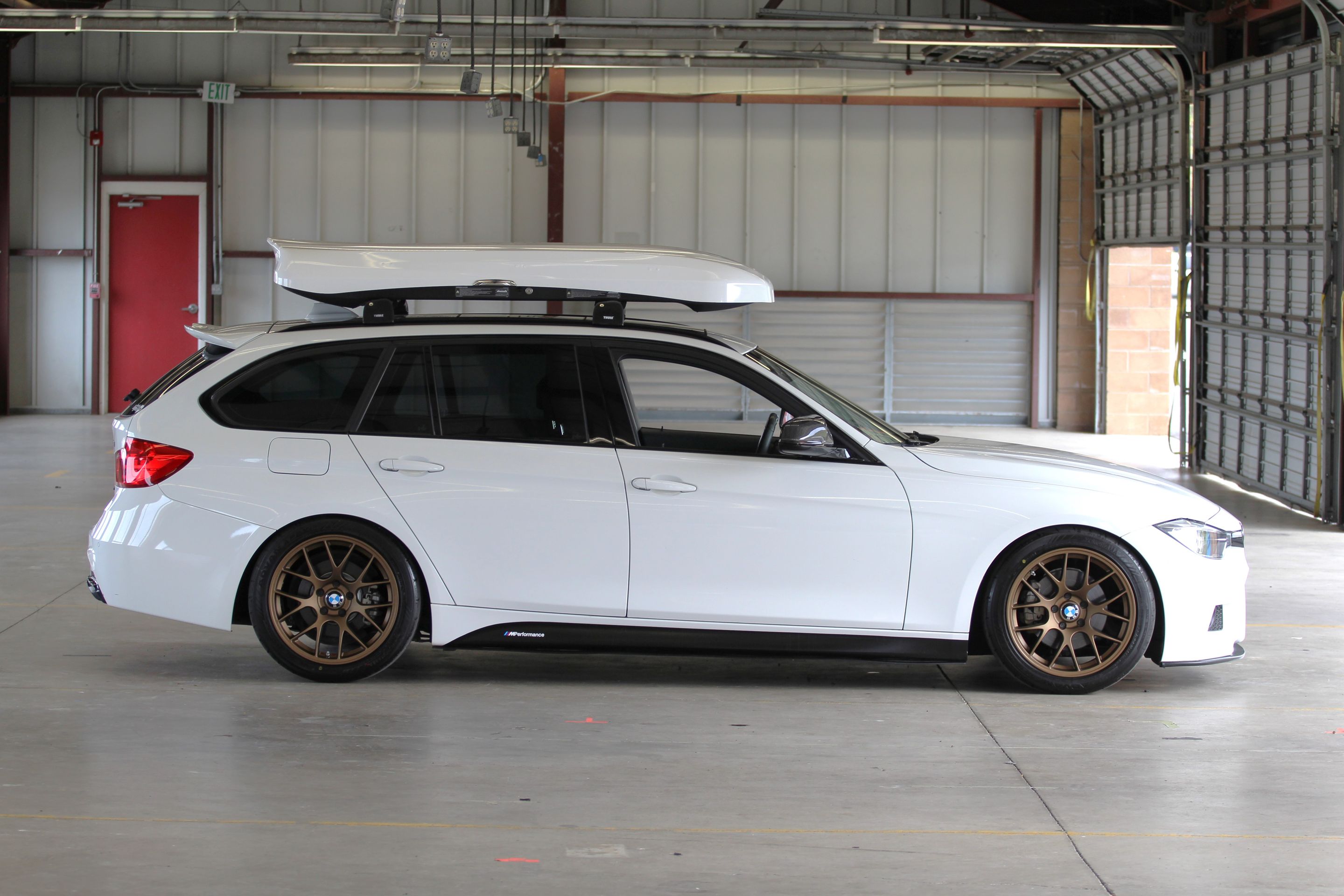 White BMW F31 Wagon 3 Series with 18" EC-7 Apex wheels in Satin Bronze