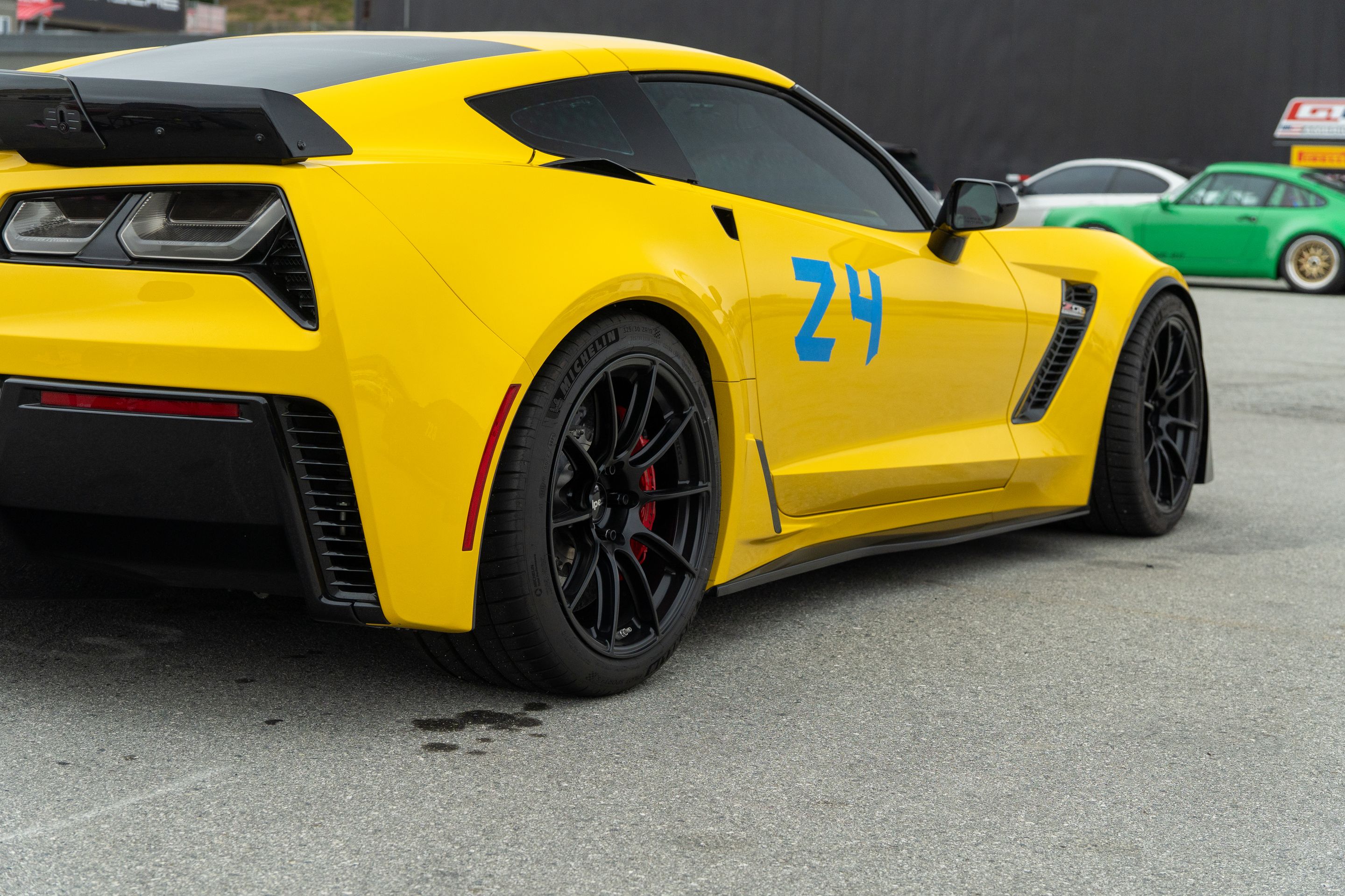 Yellow Chevrolet C7 Corvette Z06 with 19" SM-10RS Apex wheels in Satin Black