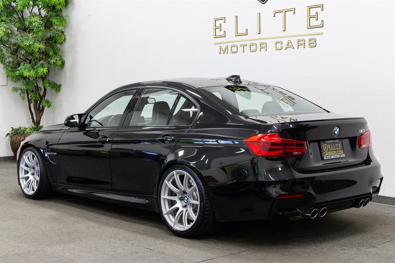 Black BMW F80 M3 with 19" SM-10 Apex wheels in Race Silver